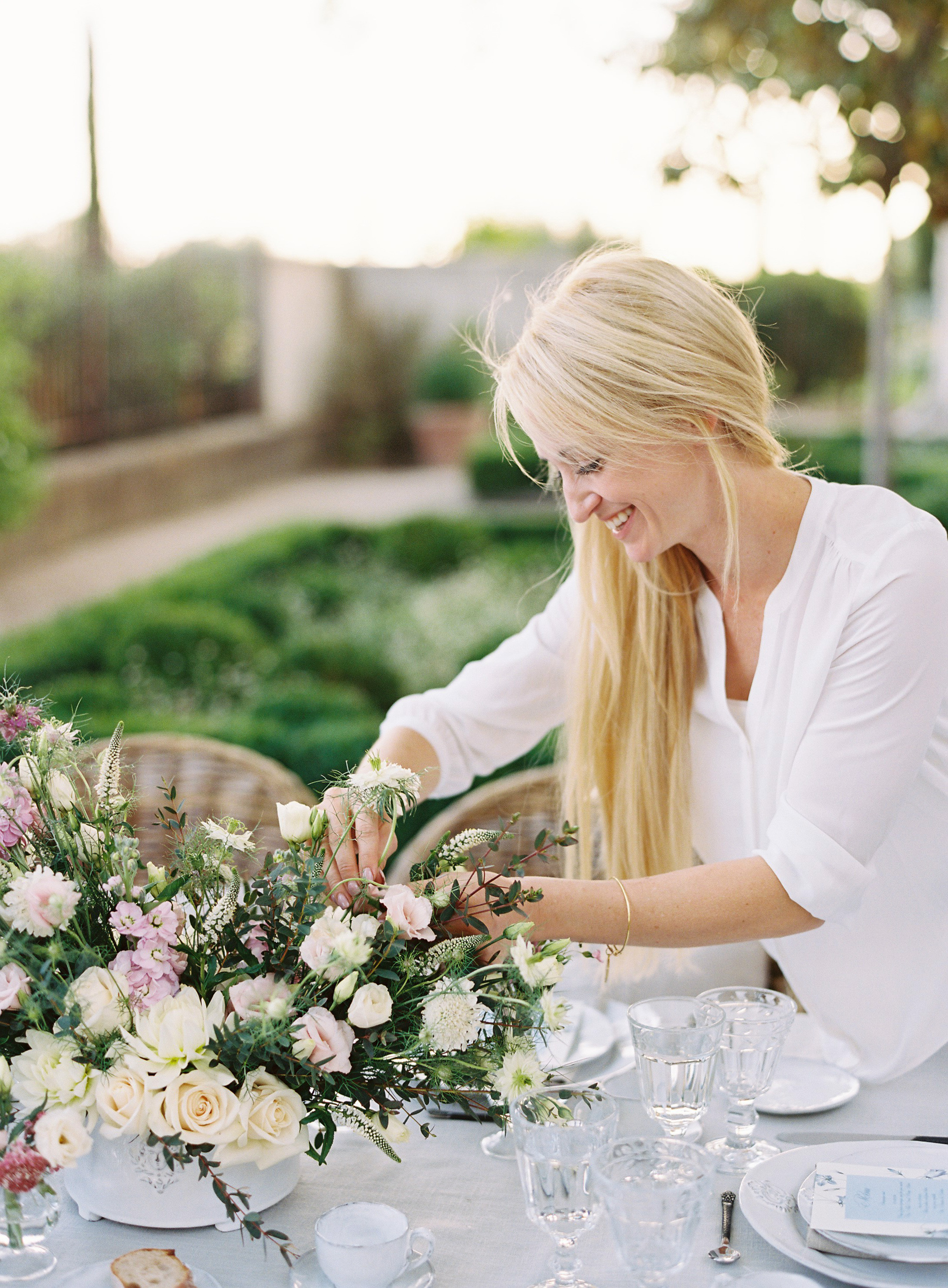 Kimberly Sisti perfecting the flowers