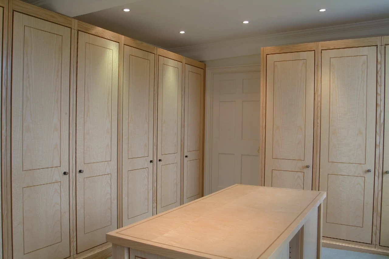 A DRESSING ROOM WHICH IS PART OF A RANGE OF OUR WORK IN ONE COTSWOLD HOUSE