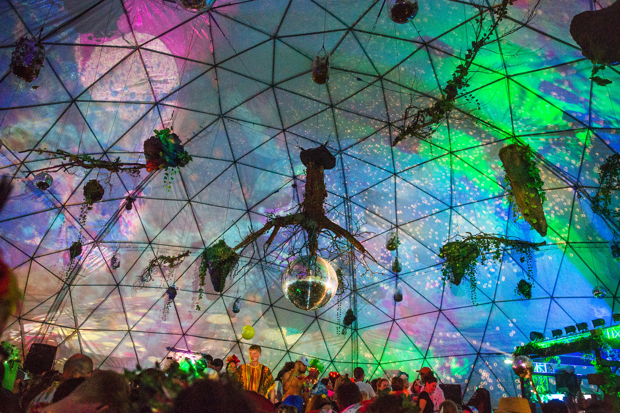 Photo - George Harrison Our stage concept Botanical Disco at Shambala Festivals . Part tropical greenhouse, part seething New York discotheque. Flashing strobe lights, sweating bodies, in a beautiful, psychedelic, Eden-esque garden setting.
