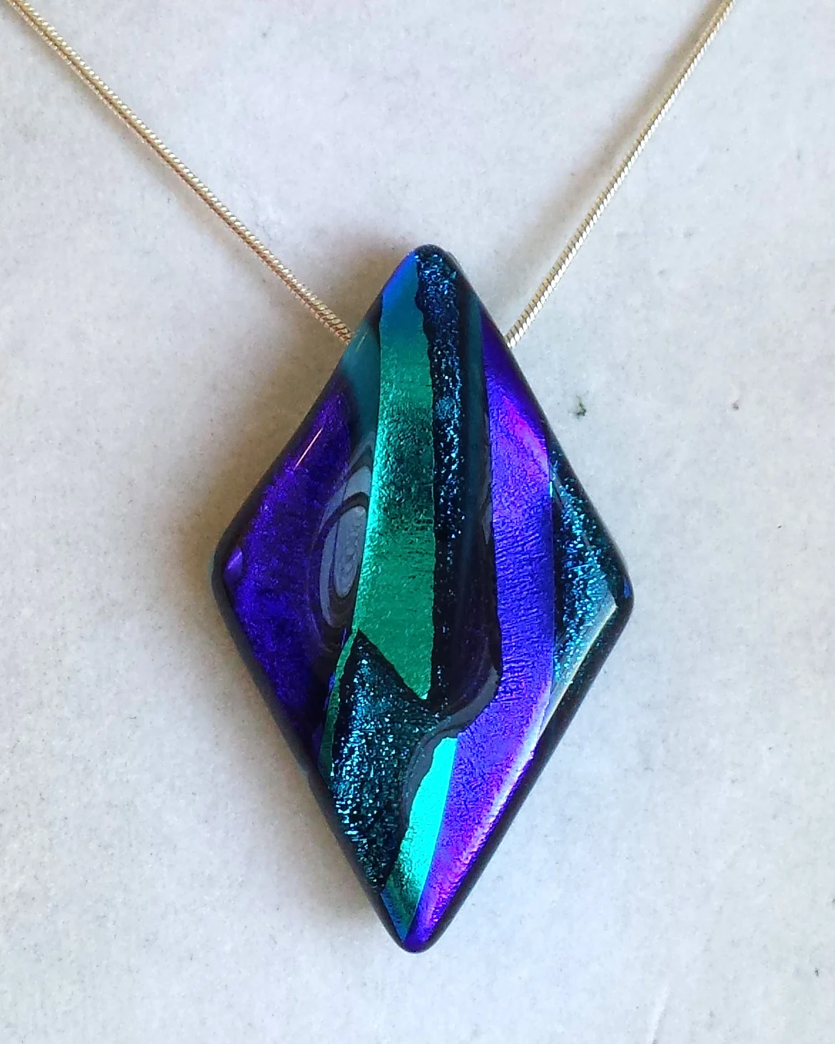 Mixed Blue Dichroic Glass Pendant on a Silver Plated Chain