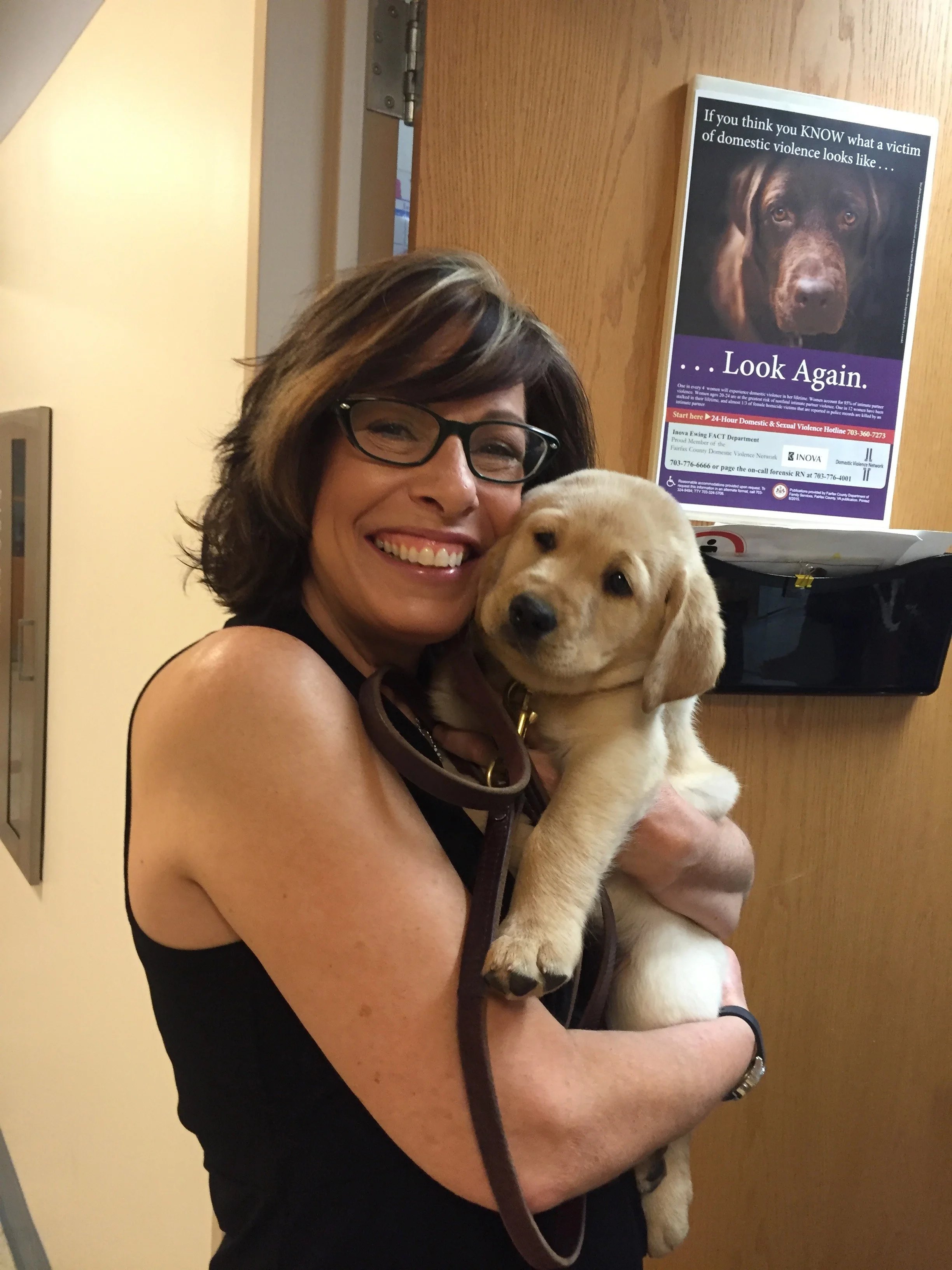 Leslie Horton with her new Service Dog, "Hero" as a puppy. 