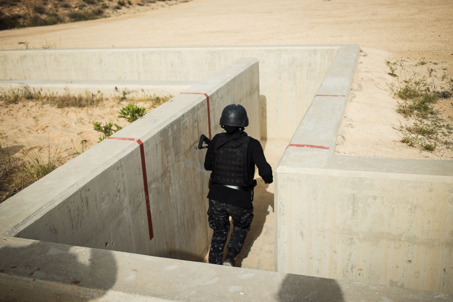  The all-women's Unit 30 SWAT Police team from Jordan competes in the three-gun gauntlet during the seventh annual Warrior Competition at the King Abdullah II Special Operations Training Center near Amman, Jordan, on April 20, 2015. 