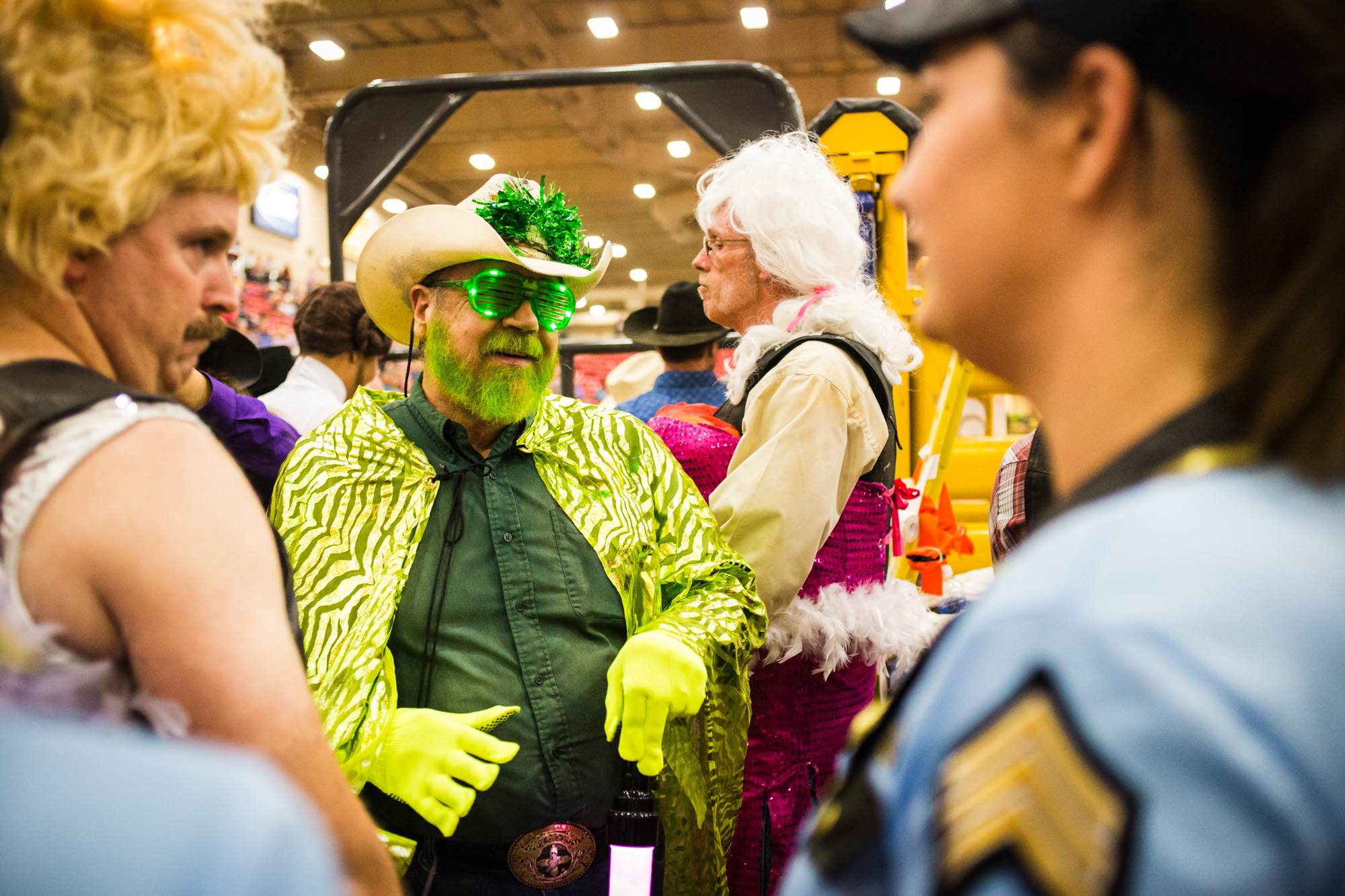  The Wild Drag Race is an event unique to the Gay Rodeo, which involves a 3-person team of a man and woman in costume, plus either a man or woman in drag. With the help of his/her teammates, the person in drag must try to mount a bucking steer after 