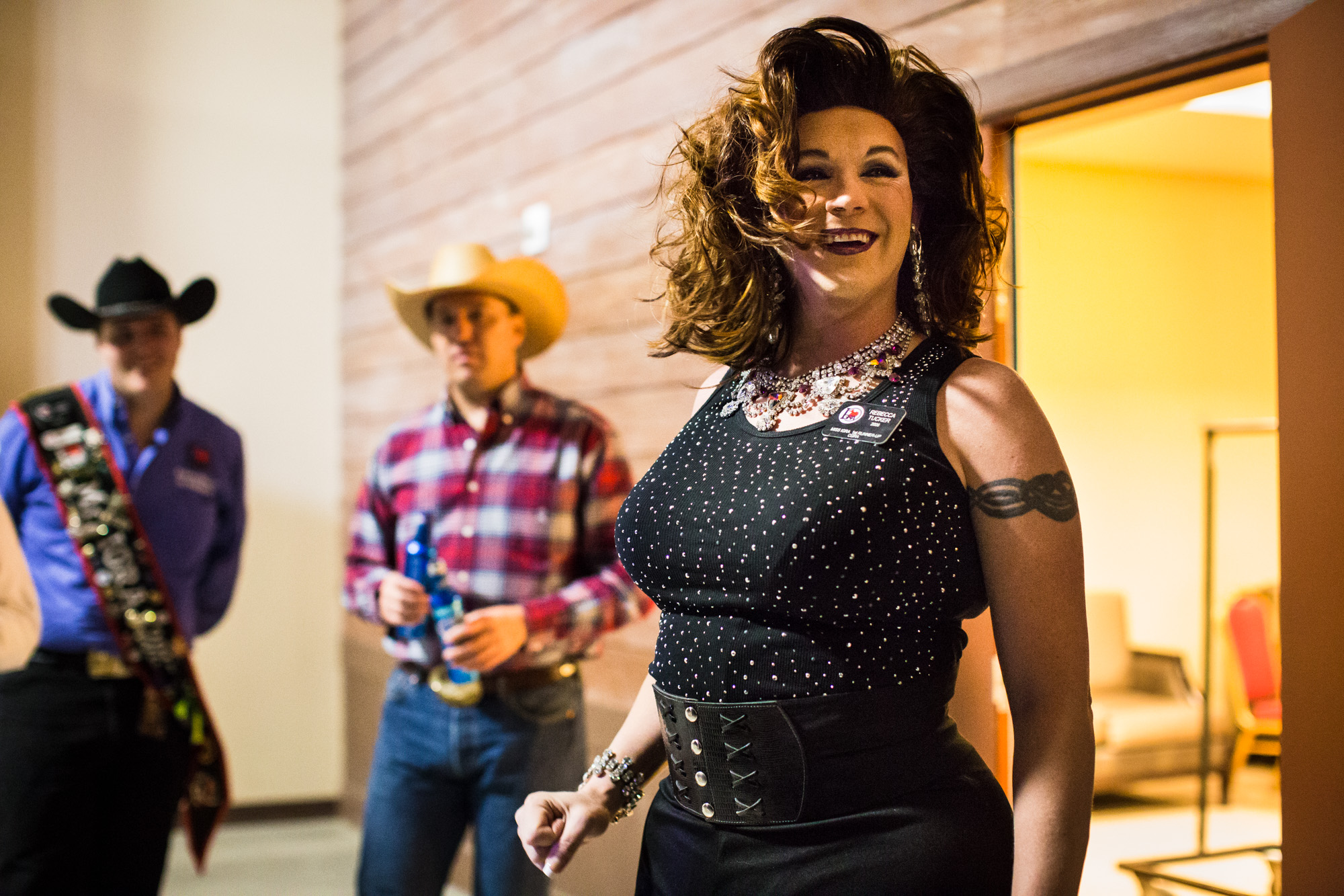 Rebecca Tucker, a contestant for Miss IGRA 2015, waits backstage before performing a song and dance as part of the Royalty Competition at the World Gay Rodeo Finals in Las Vegas, NV.