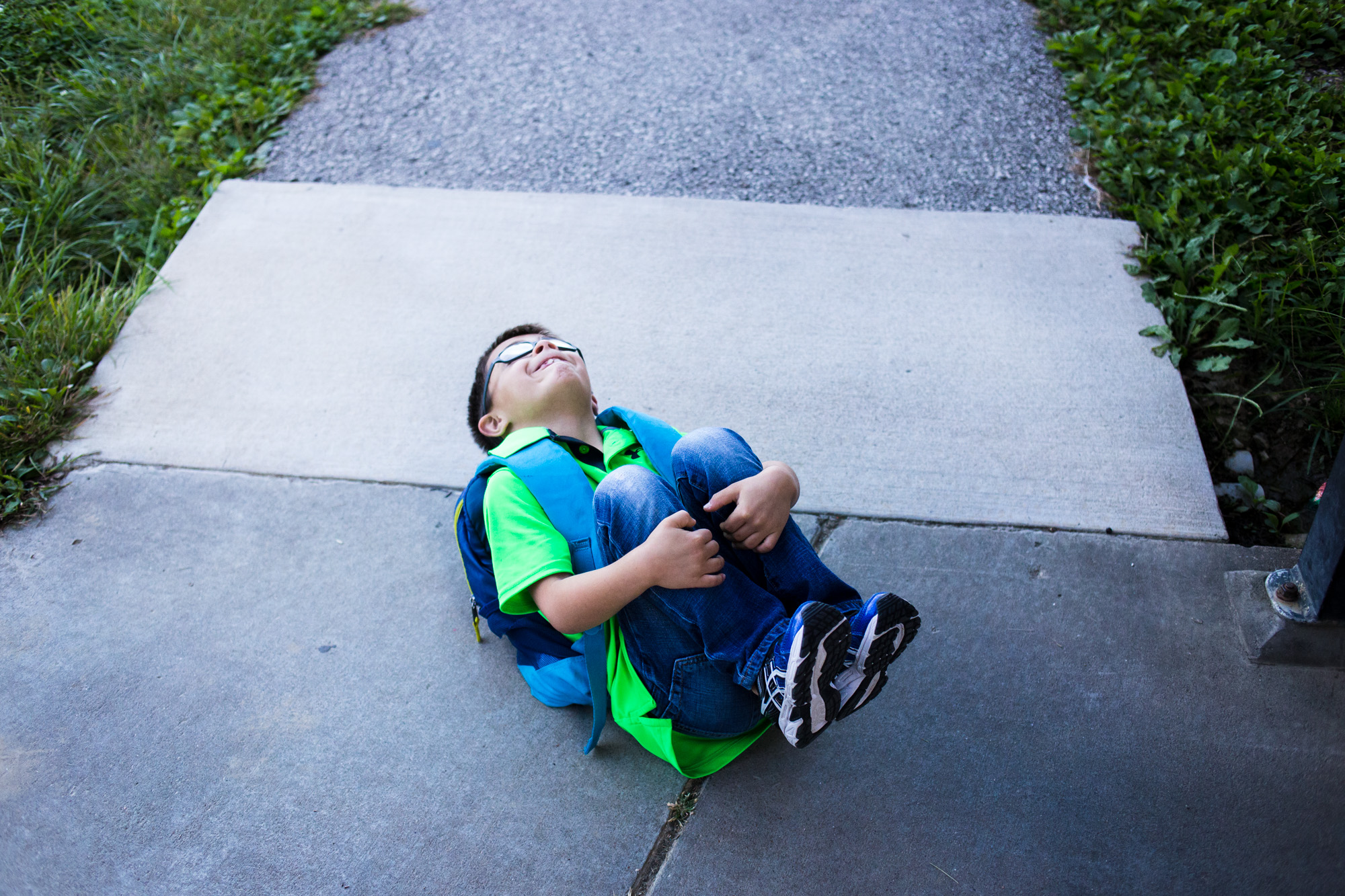  After his mom picked him up from school, Treven curled up on the sidewalk outside before bouncing back up again. Treven also has ADHD and needs medication to help him focus during the day in school. Even though he can be a lot to handle when he’s hy