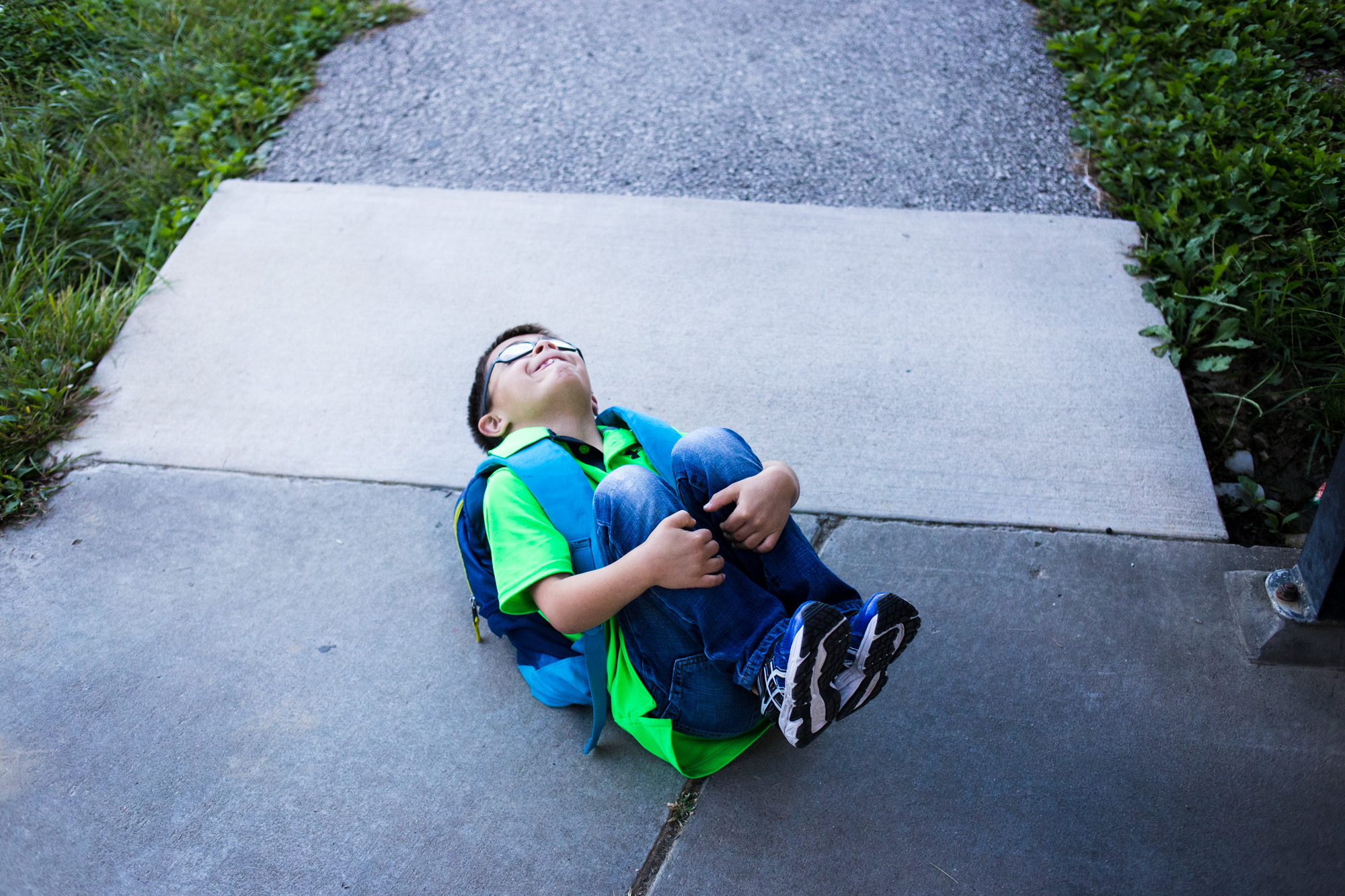 After his mom picked him up from school, Treven curled up on the sidewalk outside before bouncing back up again. Treven also has ADHD and needs medication to help him focus during the day in school. Even though he can be a lot to handle when he’s hy