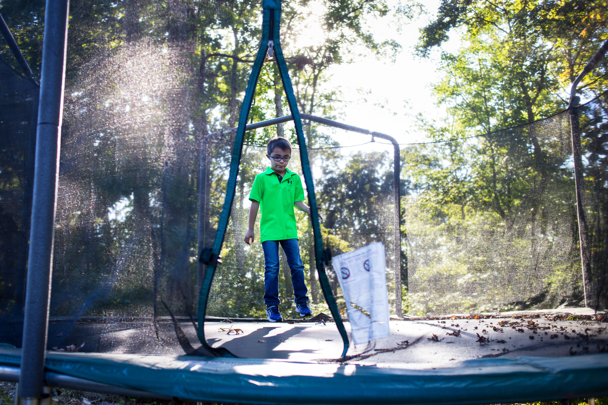  After coming home from school, Treven immediately runs to his trampoline to play for a few minutes before heading inside to do homework. 