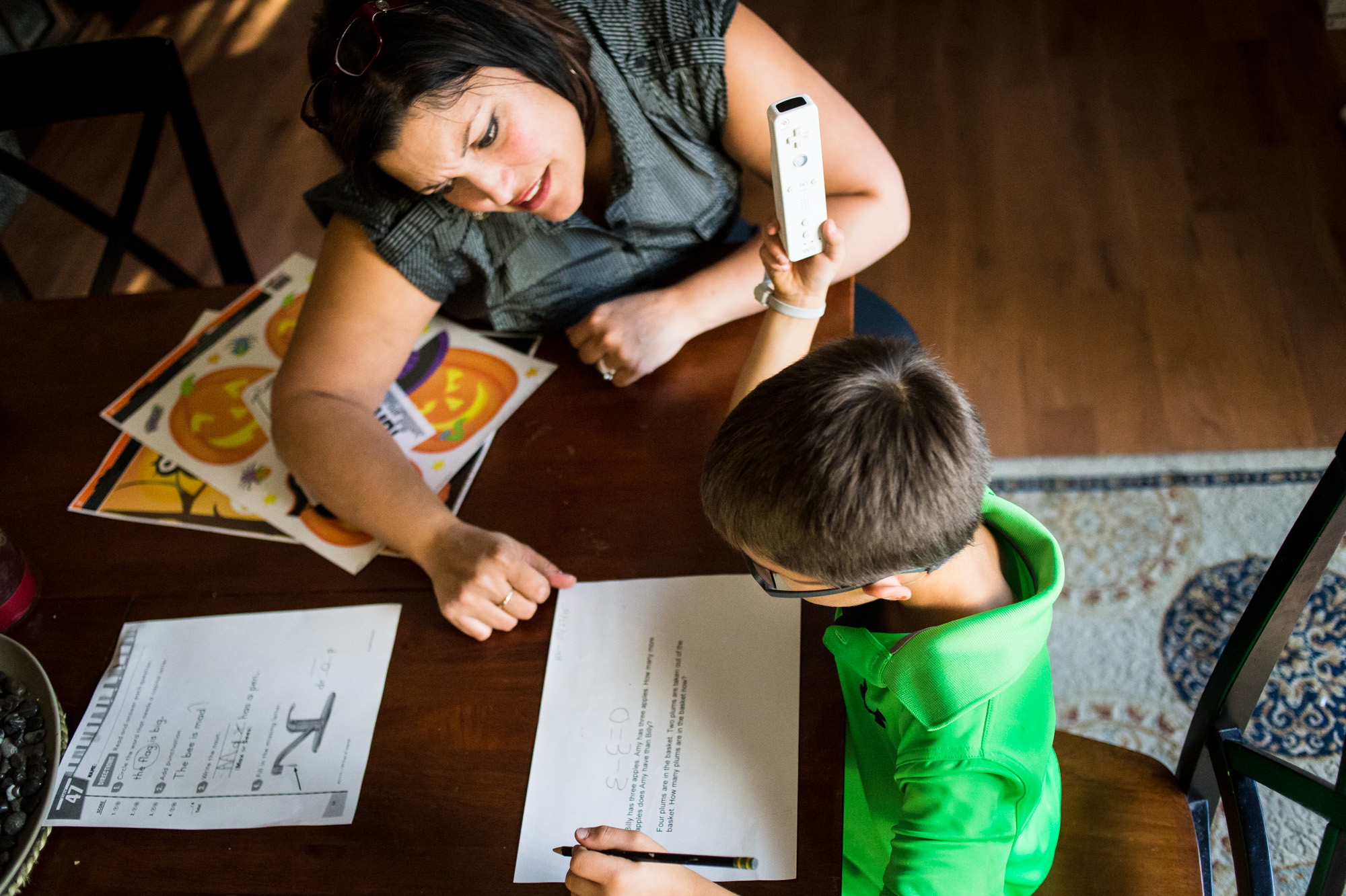  Bettina helps Treven do his homework after school on Sept. 22, 2015. “Maybe other parents would have more discipline with him, but his day at school is so structured,” Bettina says. 