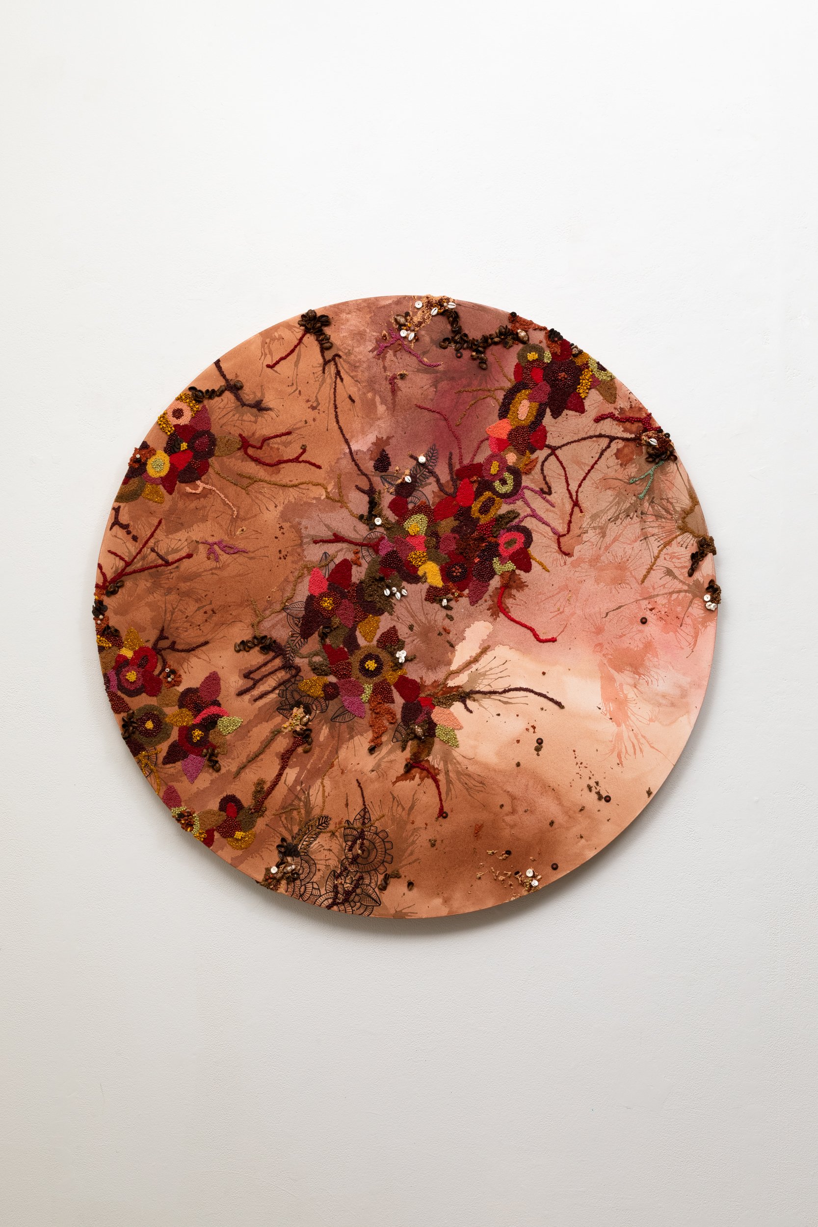  Other Mama's Grandbaby Is the Sun   2023  48 diameter inches  Oil, acrylic, glass beads, pumice, African fish bone, African coconut shell, pistachio shells, jasper, wood, cowries, and breath on cotton canvas 
