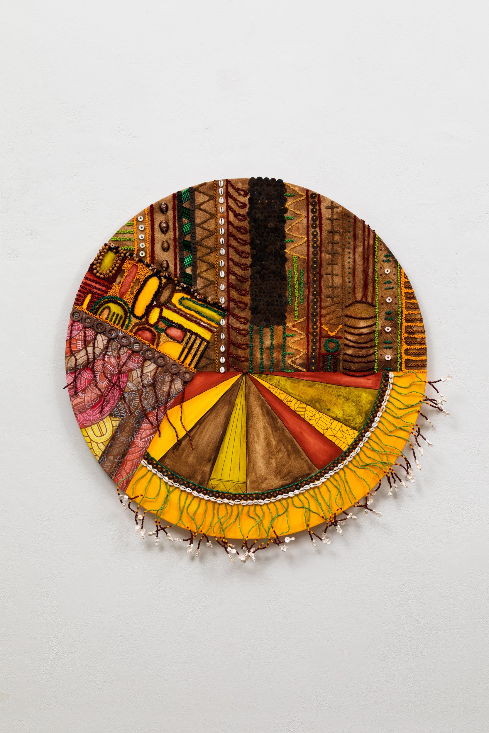  In The Midnight Sun  2023  36 diameter inches  oil,  acrylic, wood, wire, glass seed beads, cowries, African fish bone, African coconut shell, jasper, and cotton thread on cotton canvas 