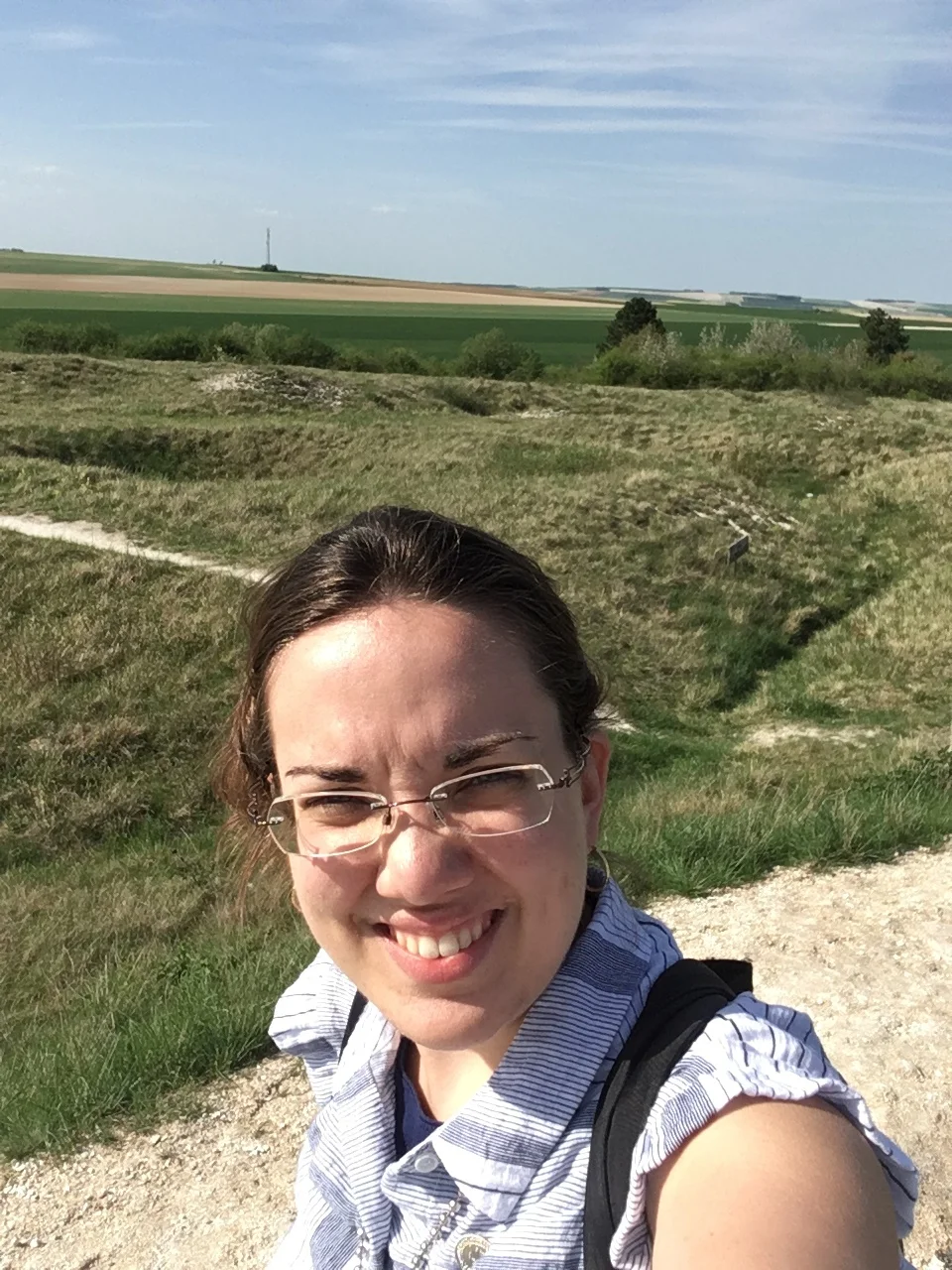 Trenches, shell holes, and farmland.
