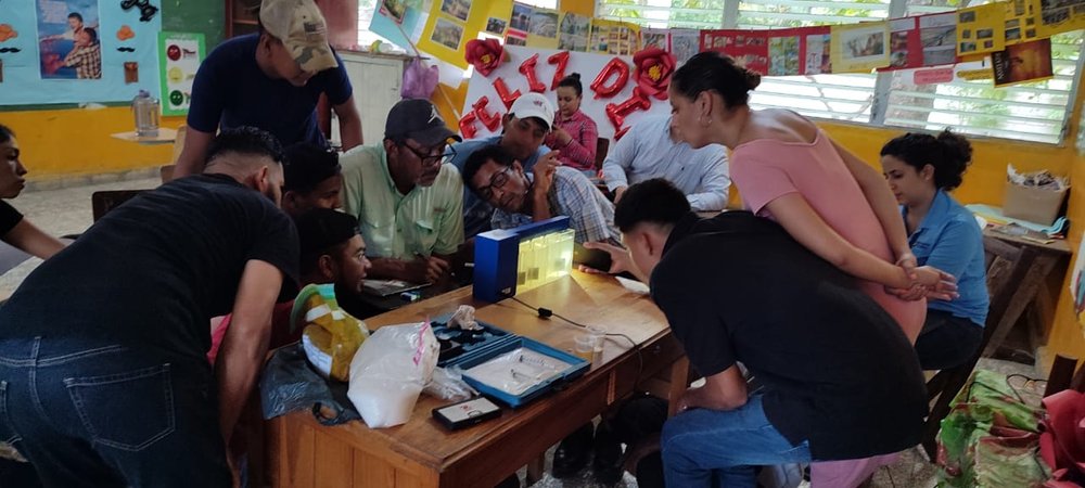  Plant operator candidates are learning about coagulant dosing, flocculation, and clarification with a jar test apparatus and some of the water they will soon be treating with the AguaClara plant. 