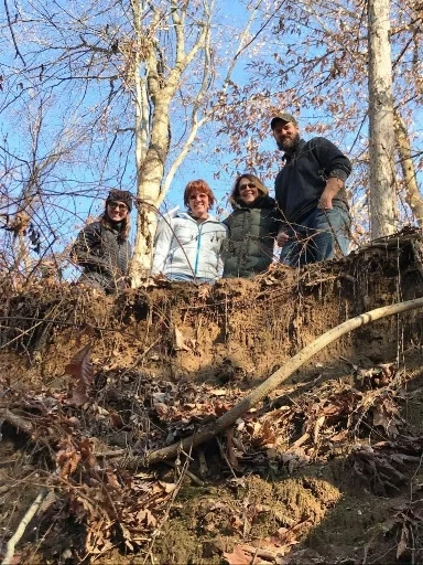Pictured left to right at a restoration site are ShoreRivers staff members Emily Harris, Kim Righi, Kristin Junkin and Josh Thompson.
