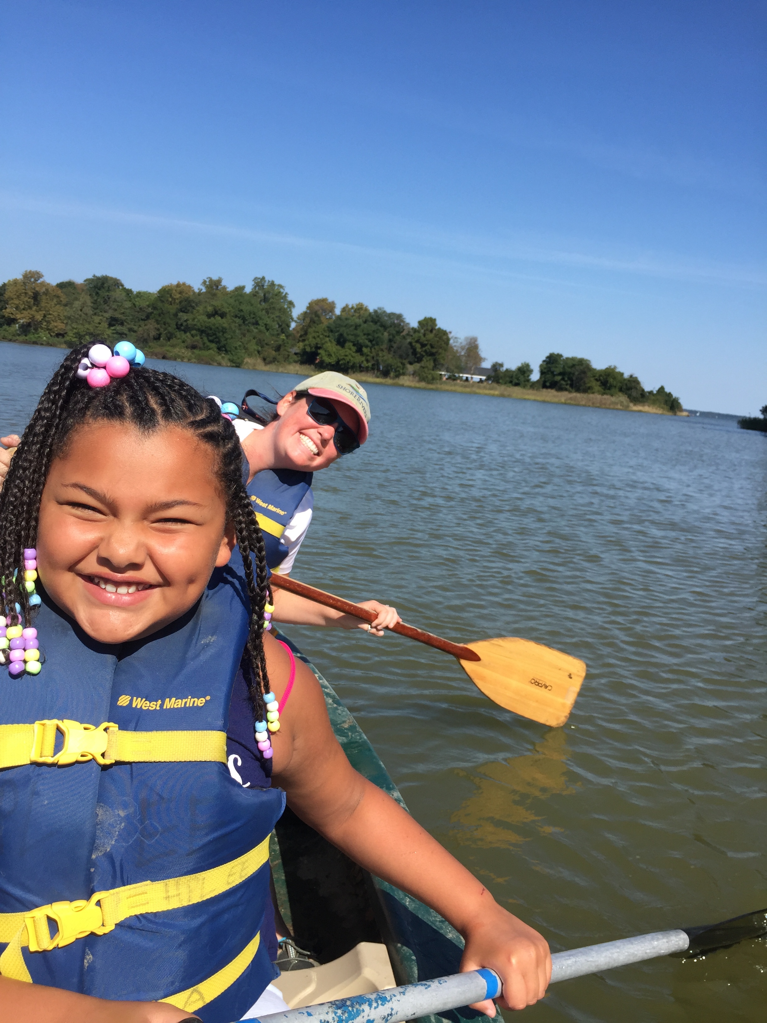 Elle and student in canoe.JPG