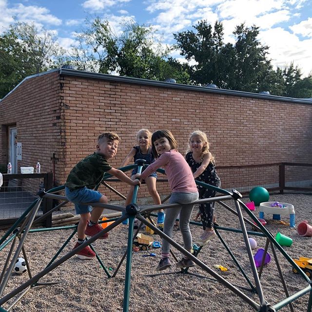 Three and four year old talk at the top of the dome! #playground #montessori #warmweather #dome #montessorilife #play #gossip #friends