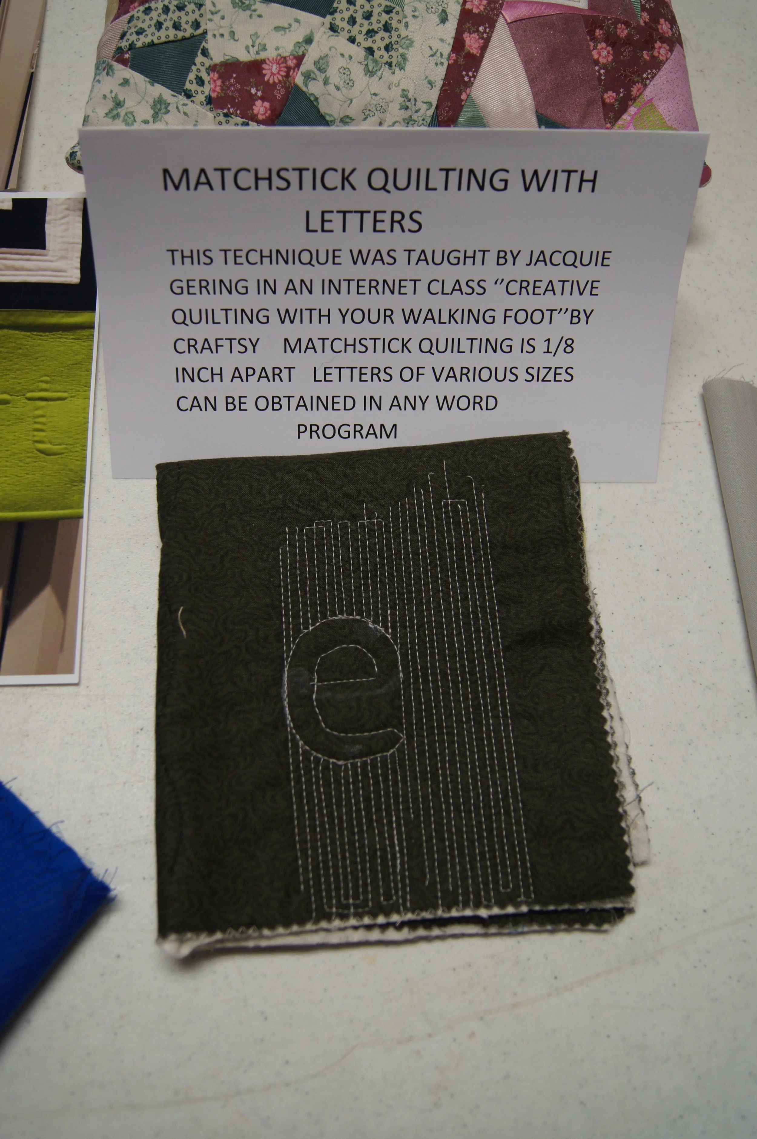 An example of how to create letters in relief with matchstick quilting