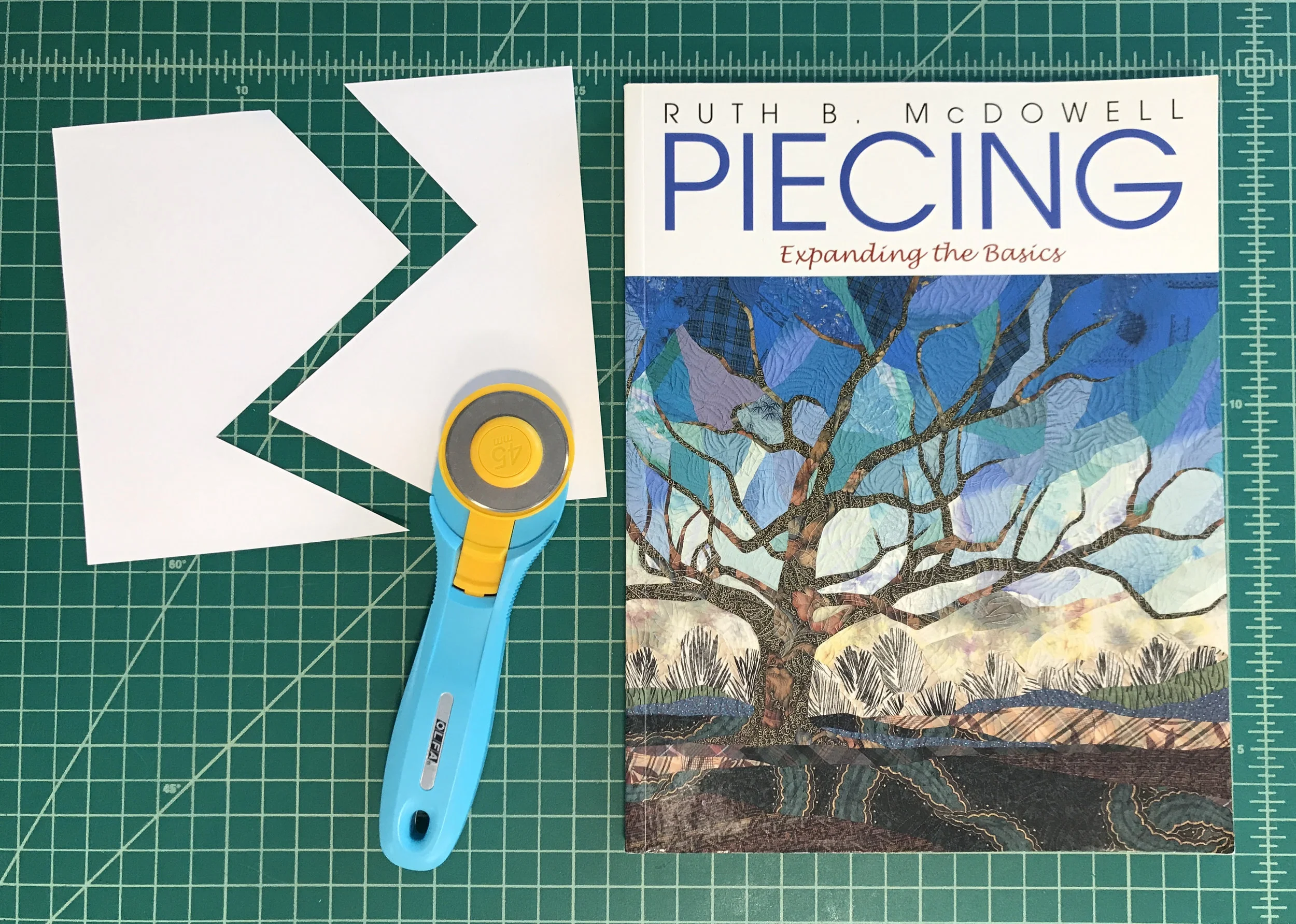 Ruth McDowell's book "Piecing: Expanding the Basics" is a great resource.