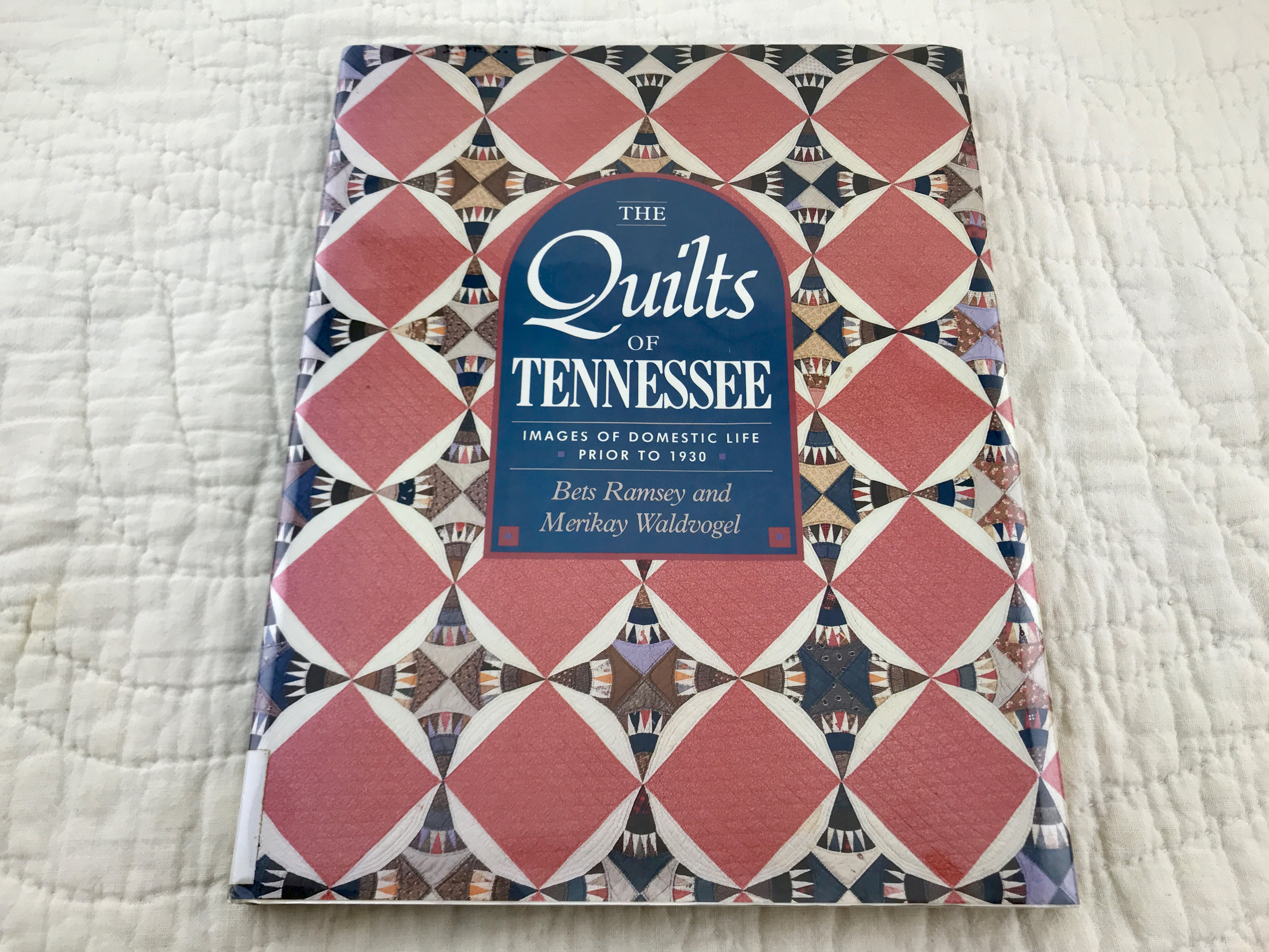 Our 2019 QuiltCon Charity Quilt Challenge entry will be inspired by an antique quilt in this book