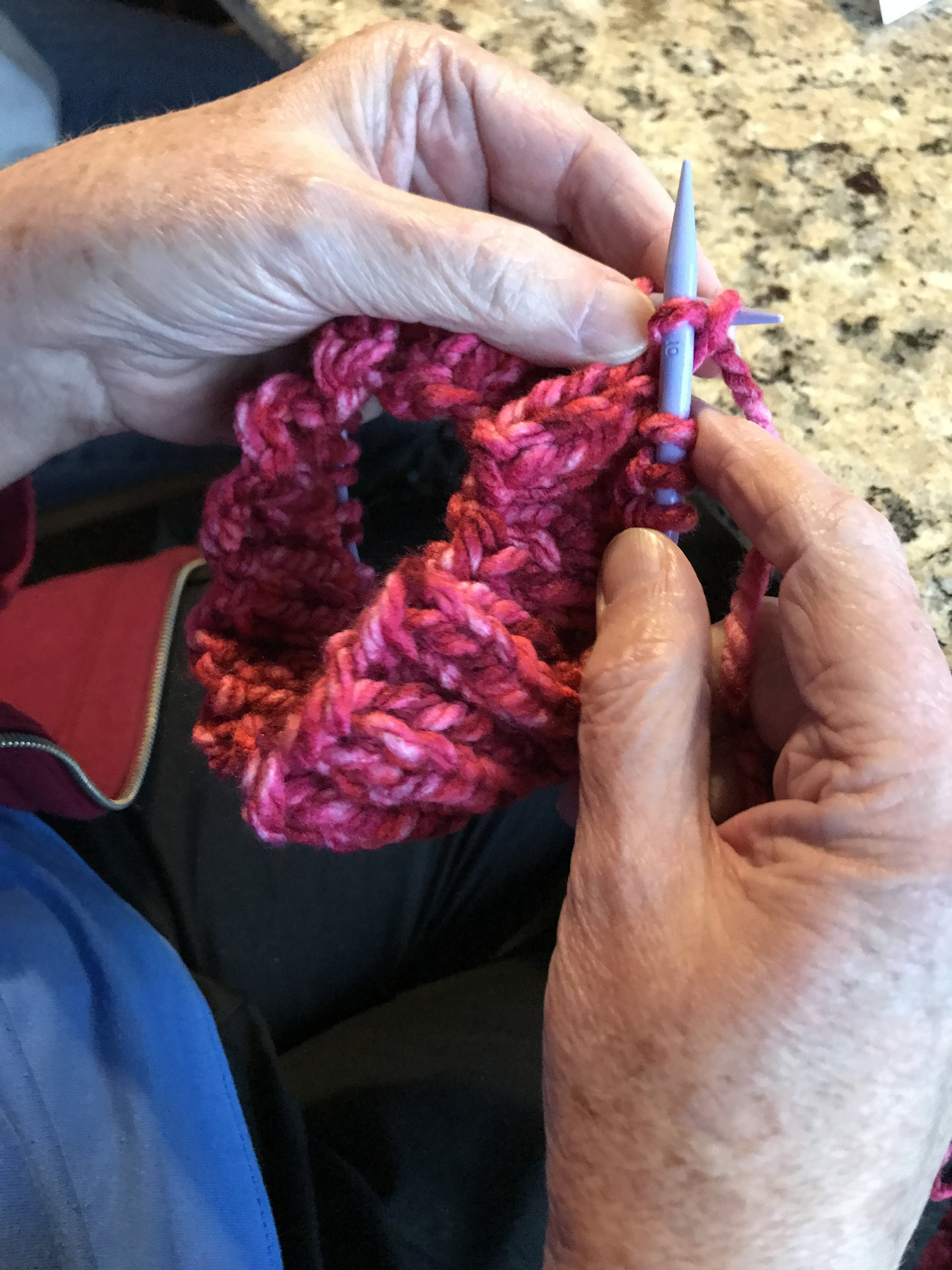 Jean was working her knitting needles