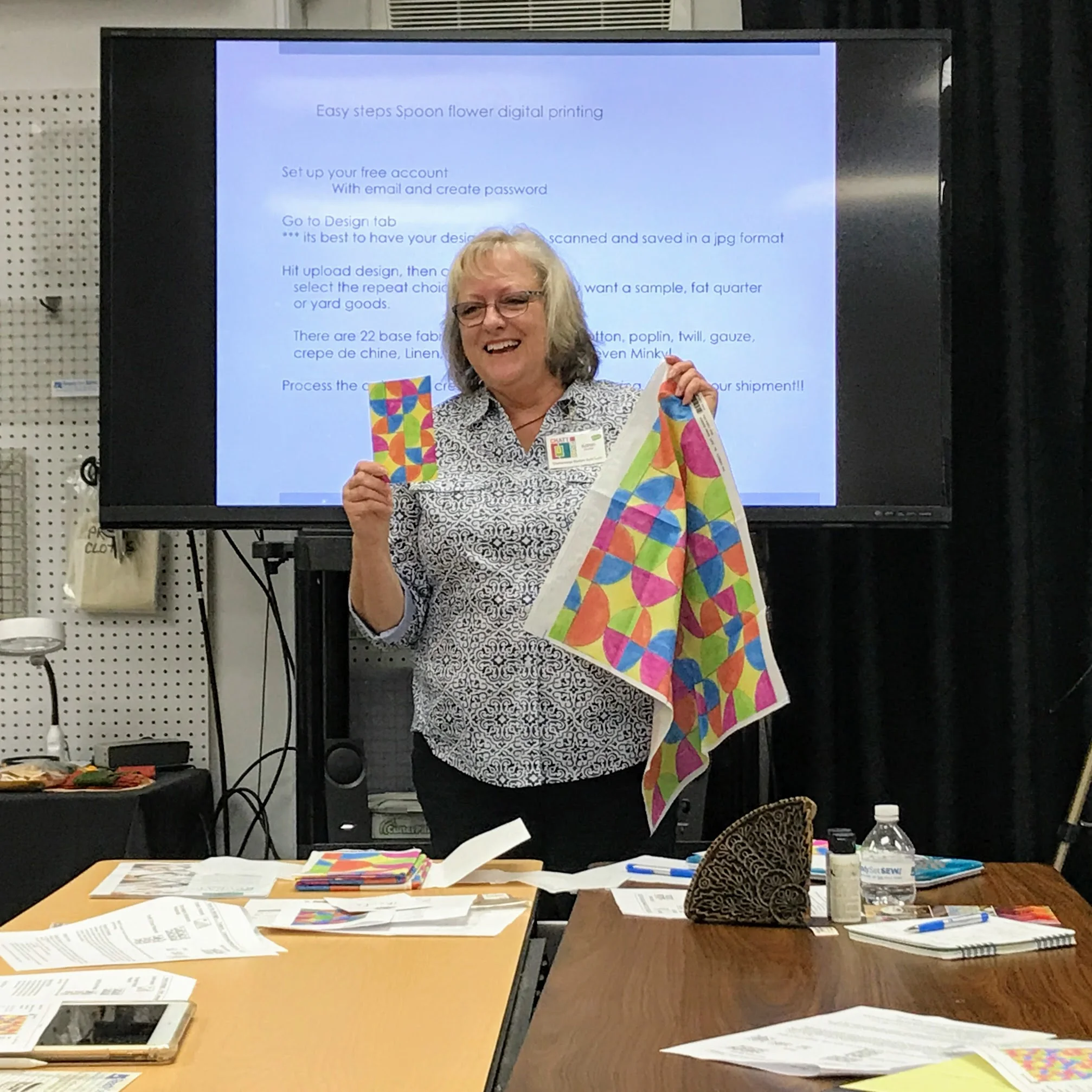 Karen Downer painted her design by hand on graph paper (left) before she converted it to a digital file to print on fabric via Spoonflower (right).
