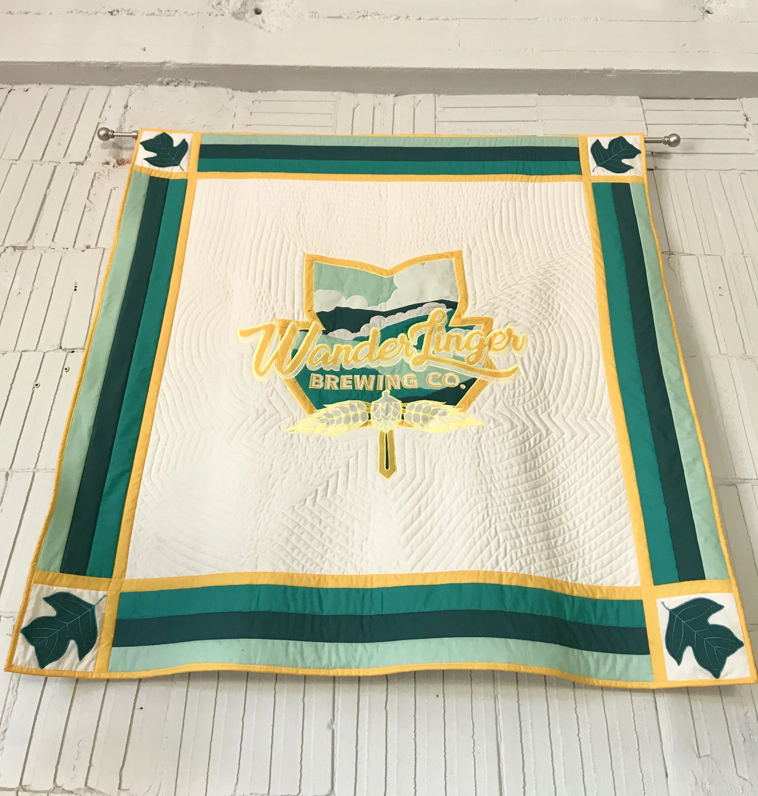 The owner’s mother-in-law made this quilted banner for the brewery.