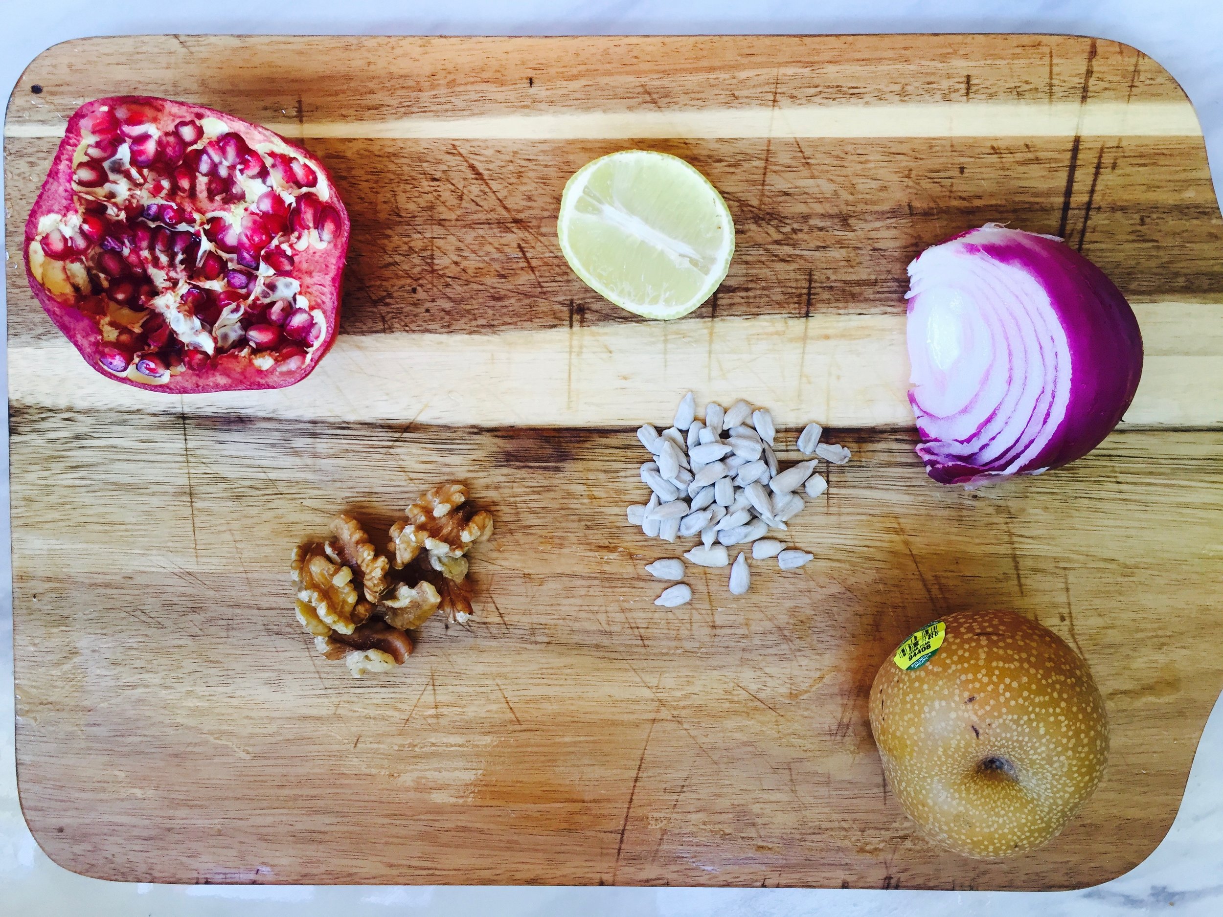 Pomegranate, red onion, asian pear, lemon, walnuts, sunflower seeds