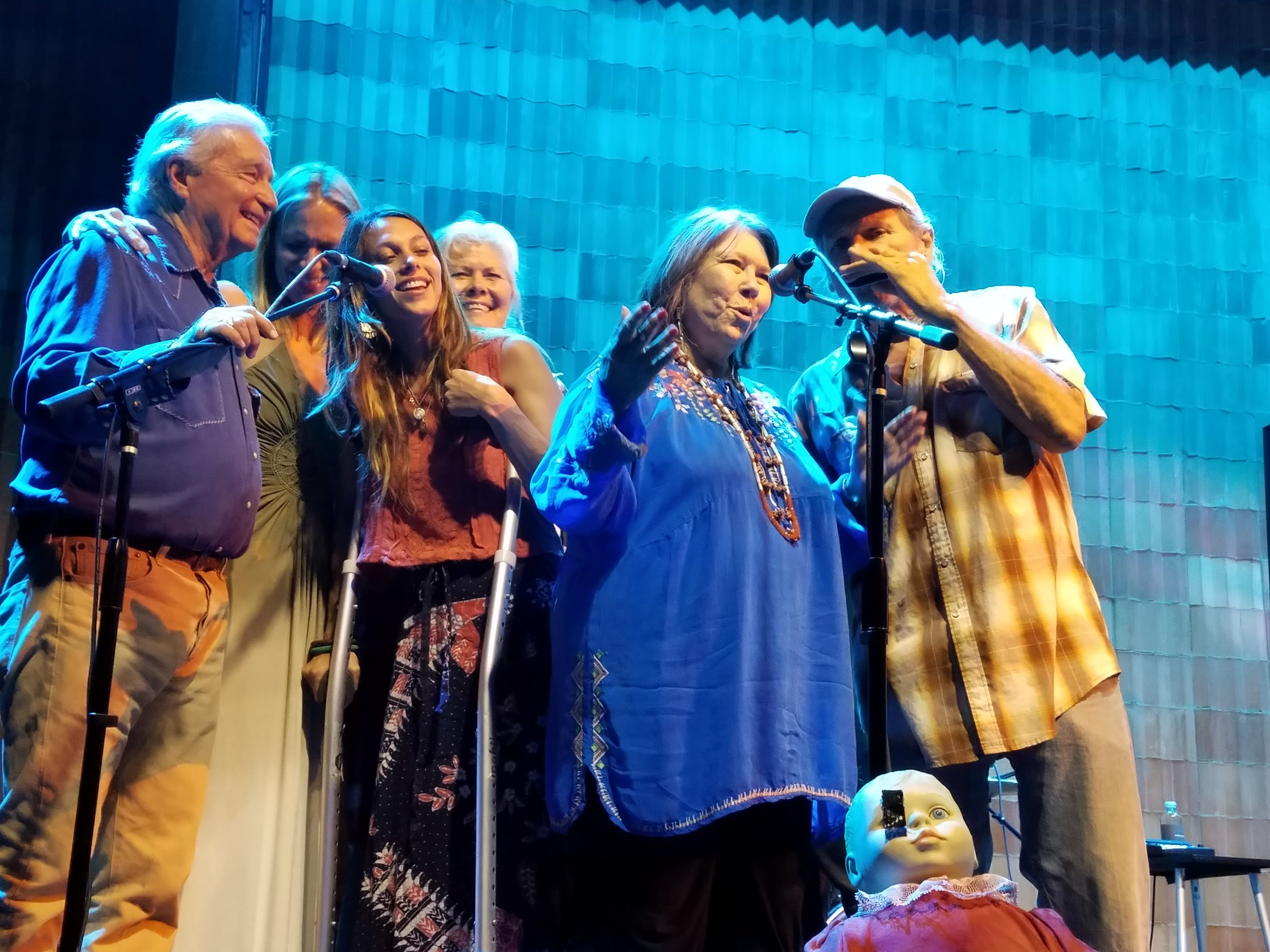 Jo Harvey Allen, center in blue smock at Marfa, Texas concert celebrating her 55th anniversary. Dick DeGuerin on left.