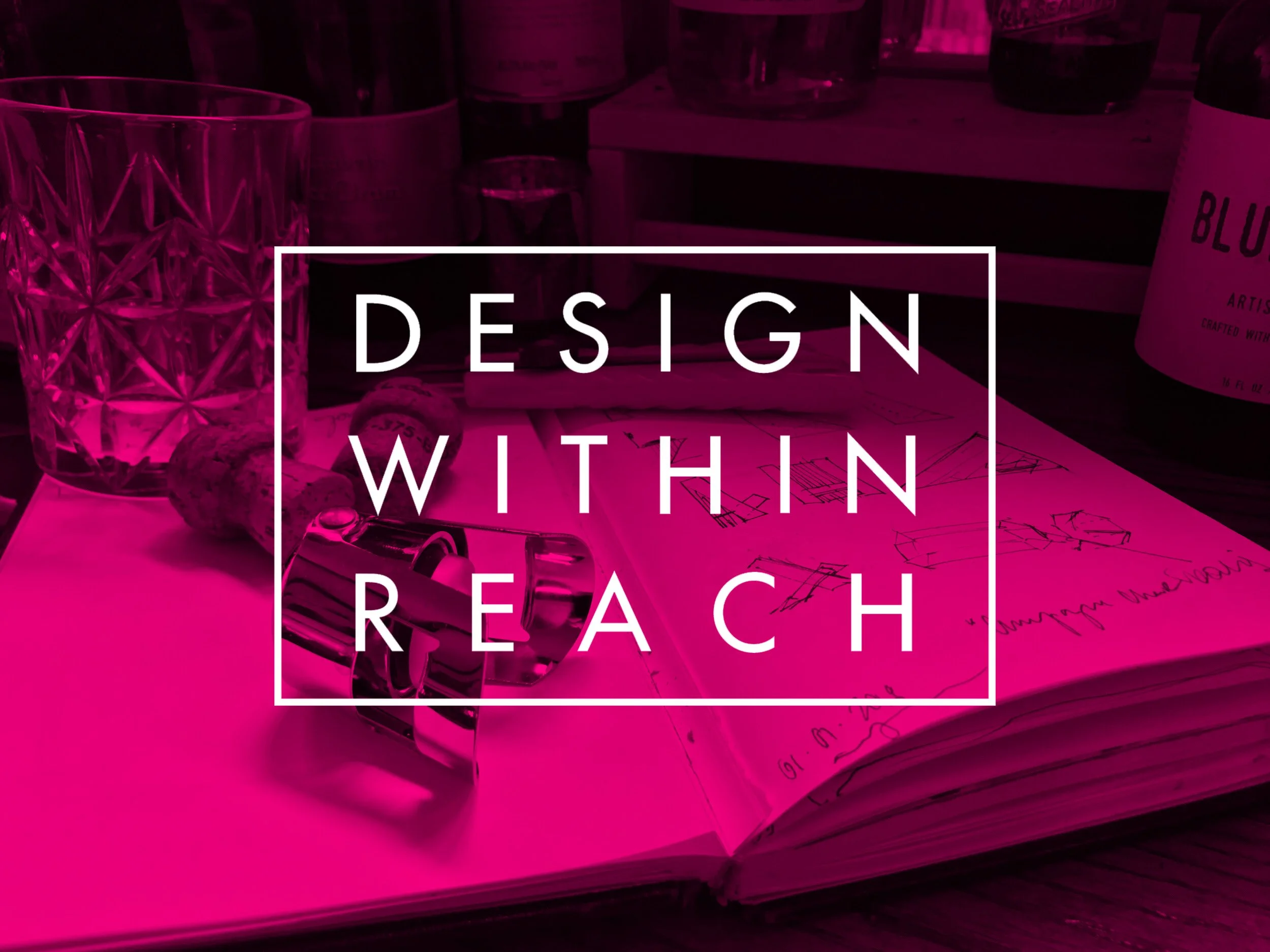 A workspace with wine corks, sketches of furniture designs in a notebook, and a yellow utility knife with a pink translucent title block overlay with the words "DESIGN WITHIN REACH" in white letters.