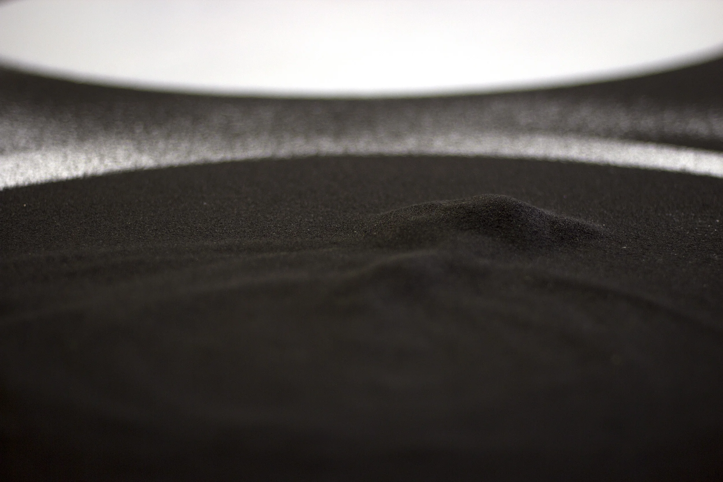 13:1 (circle packing) , 2015 (detail) black sand 1 x 144 x 144 in. collaboration with Surabhi Ghosh Ditch Projects , Springfield OR
