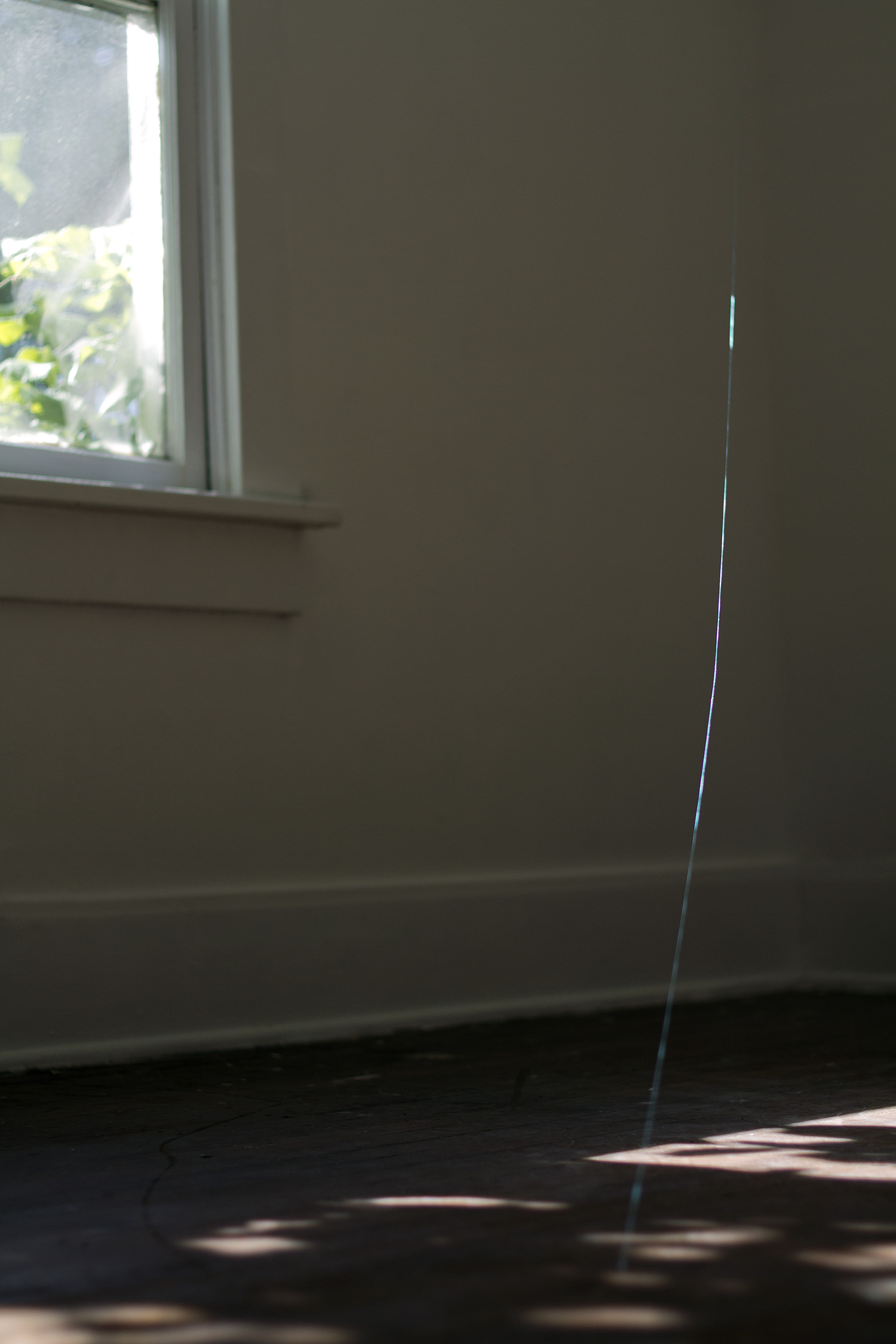    this dust won't re-form into rain  , 2012 string, natural light, wind 88 x 104.5 x 58.5 in.  Wilkinson House, University of Oregon, Eugene OR 