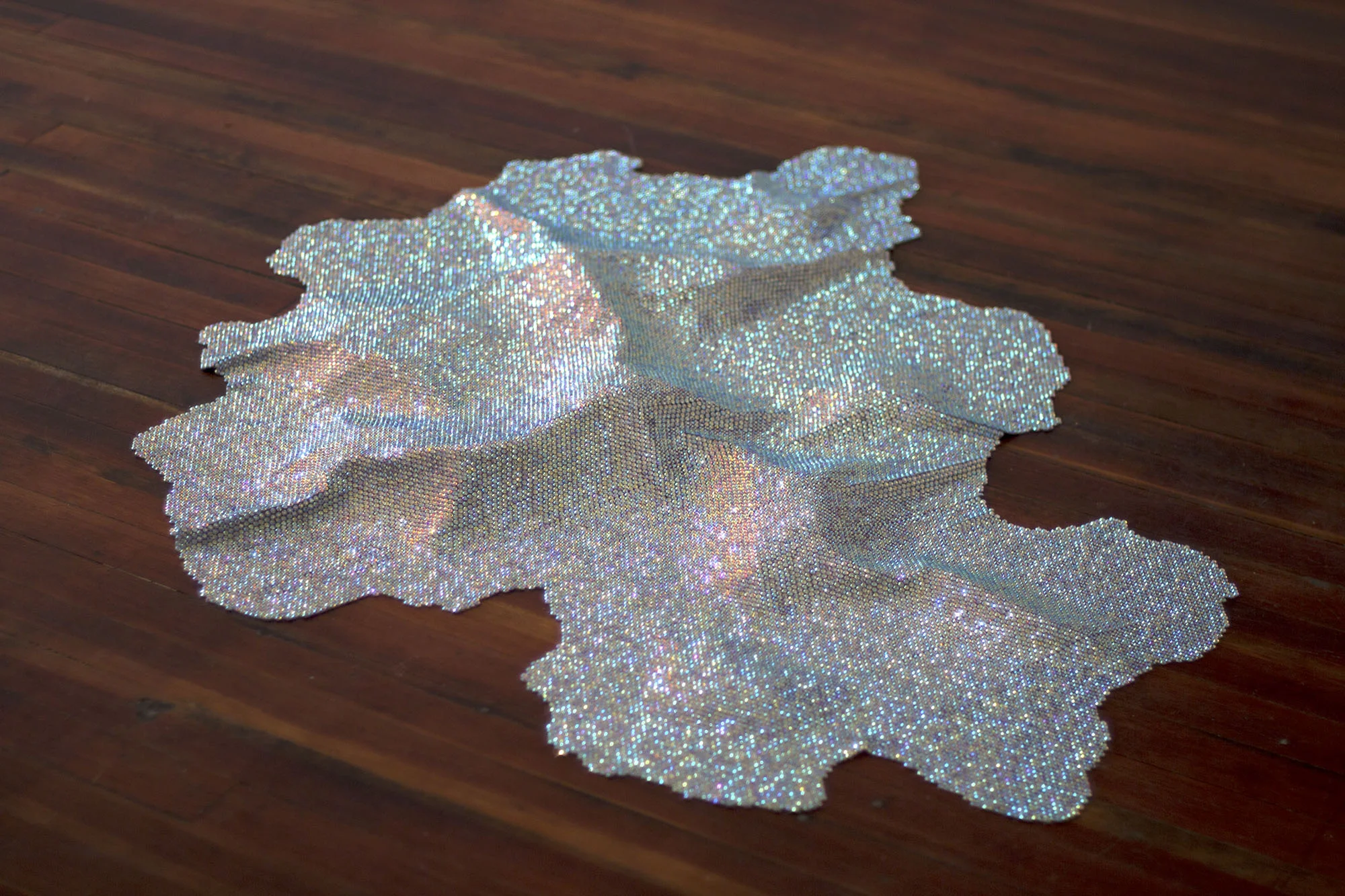 ís, magnetic midnight , 2015 (detail) hand-set iridescent a.b. rhinestones, indigo-dyed velvet rhinestones 3 x 38 x 47 in.; velvet 36 x 32 in. SEDIMENT , Richmond VA