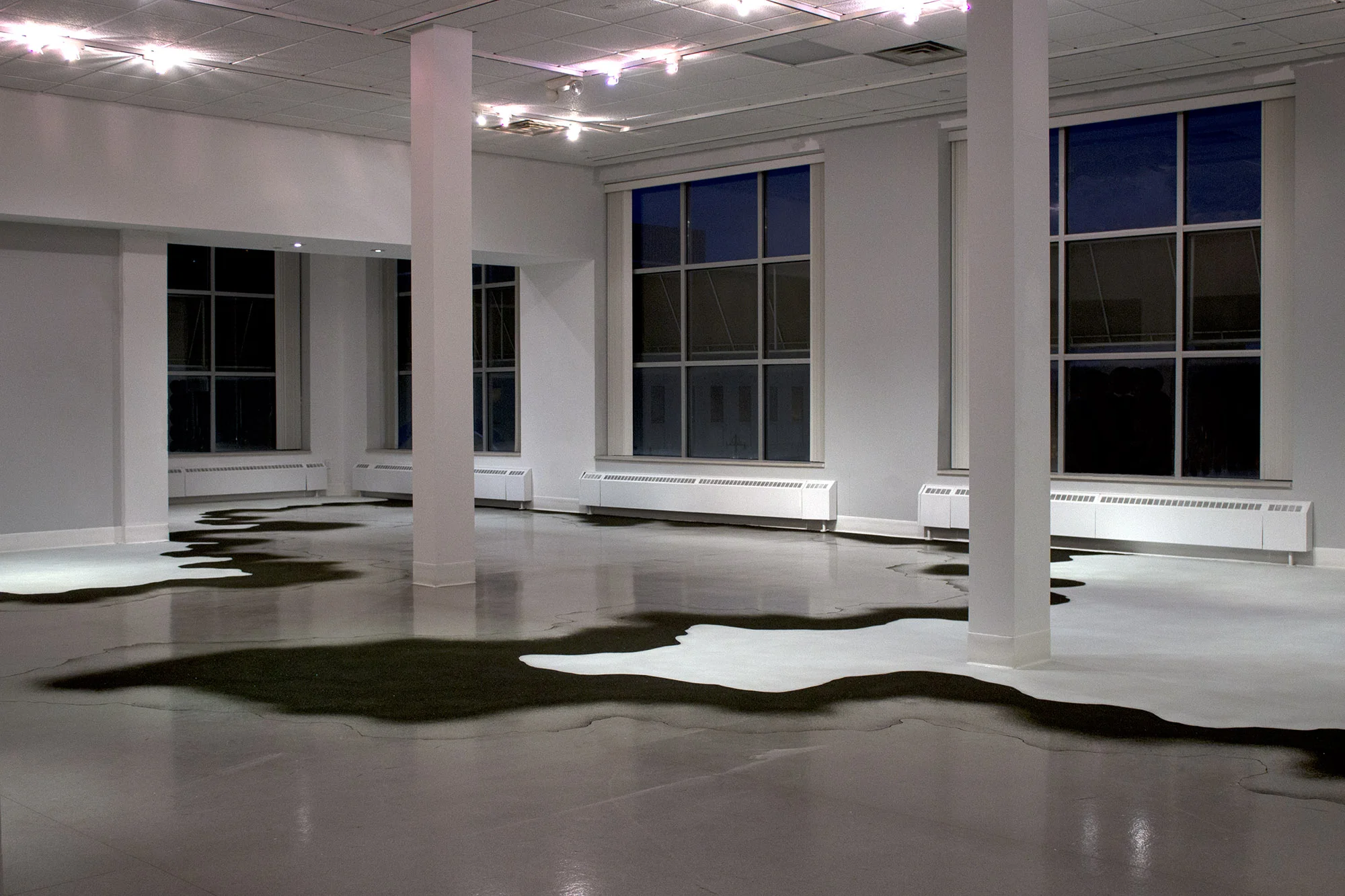 the rush of land in my ears , 2015 (partial installation view) glass microspheres, coal slag 55.5 x 56.5 ft. as installed Peoria Art Guild, Peoria IL