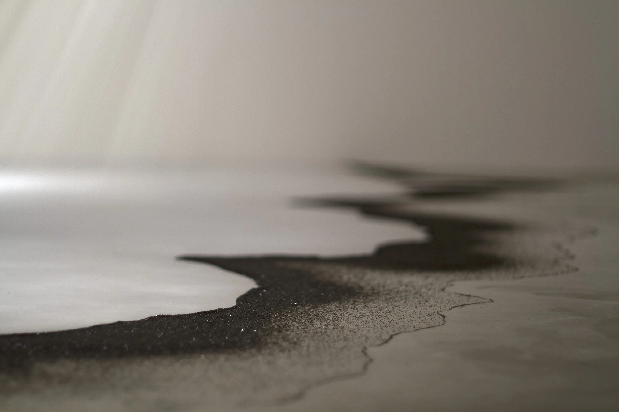 conditional presences , 2013 (detail) silk string, glass microspheres, coal slag, light 9 x 13.5 x 16 ft. image credit | Ian Clark Disjecta , Portland OR