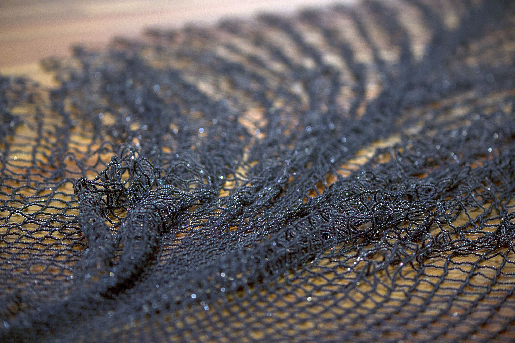 to reinforce a glacier , 2017 (detail) hand-beaded net gallery installation of site-responsive work with Fláajökull glacial tongue and Breiðamerkurjökull iceberg, Vatnajökull, Iceland 8.5 x 8 x 20 ft. as installed Antenna , New Orleans LA