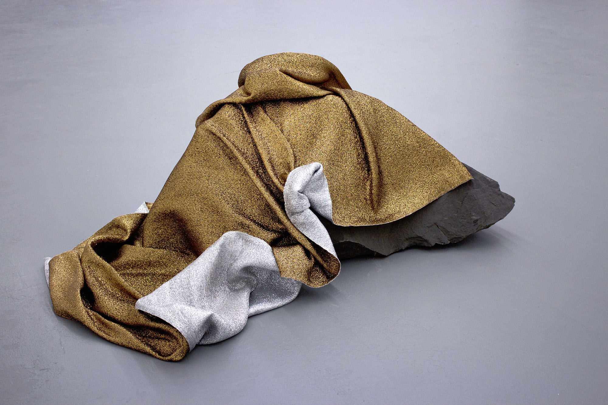 (emergency) (space) blanket for the moon , 2016 hand-woven bronze and silver mylar thread (satin weave), rundle boulder 22.5 x 51 x 35.5 in. TRUCK Contemporary Art , Calgary AB