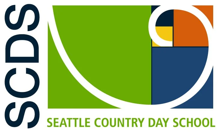Logo for Seattle Country Day School with large green and blue geometric shapes and the text 'Seattle Country Day School' below.