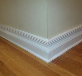 use-inexpensive-molding-to-get-upscale-looking-baseboards--diy-home-improvement-wall-decor.jpg