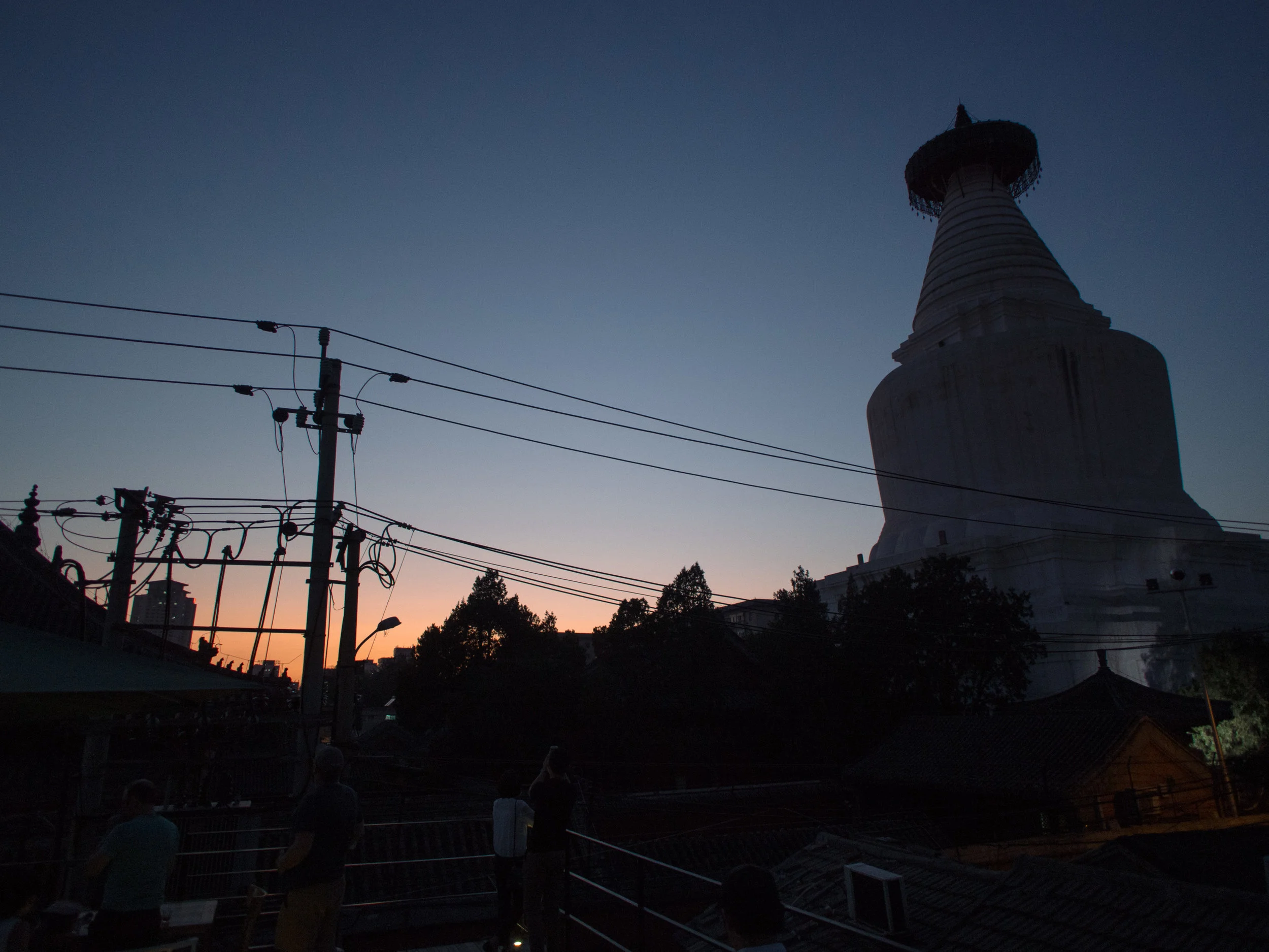 Beijing's White Cloud Pagoda (Baitasi) at dusk. 