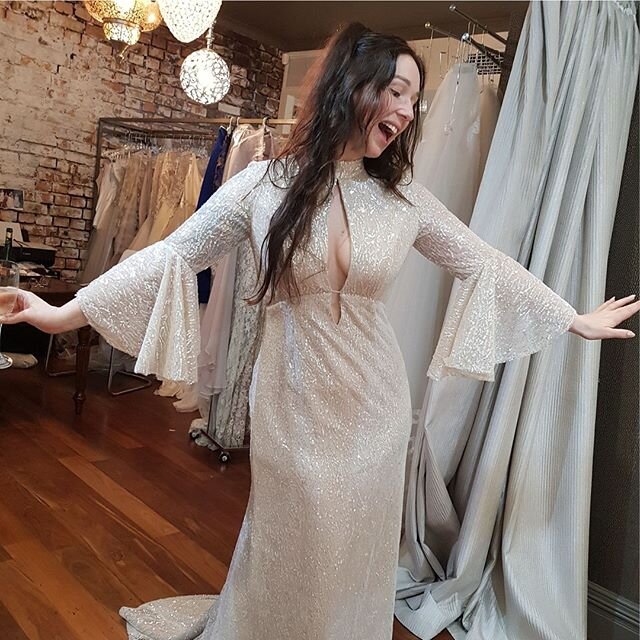 Our favourite sassy bride! She wanted a dress that reflected her bubbly attitude and style so we created a glitter tulle gown with metallic mesh over a silk crepe. Just beautiful!