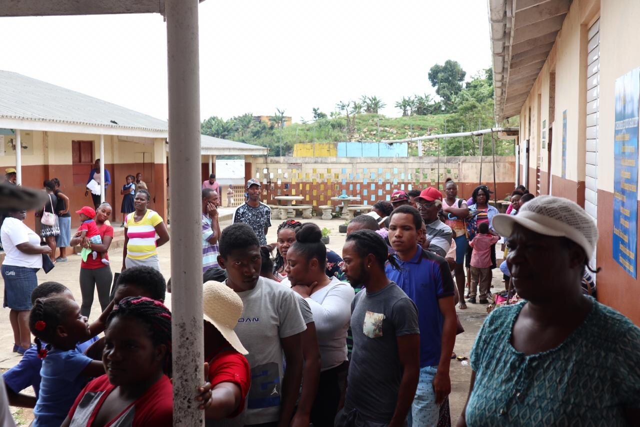 A steady flow of patients waiting to be registered