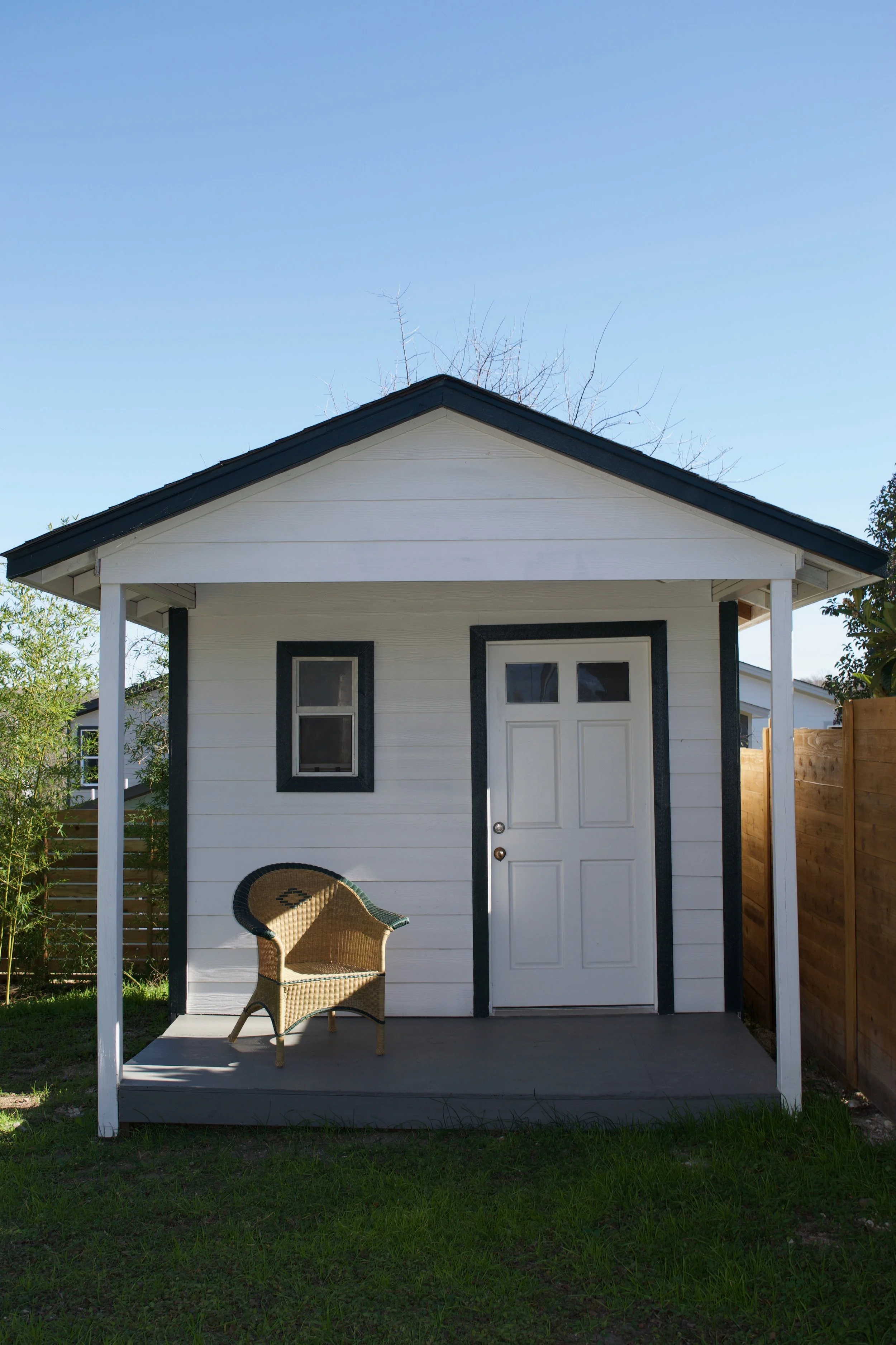 Our painter took some creative liberty on the shed with our leftover exterior paint ;)