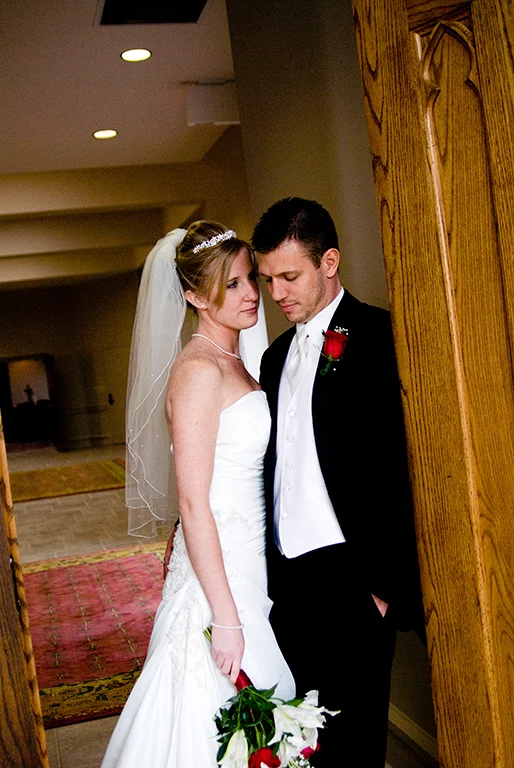 Bride-and-Groom-in-the-doorway-of-the-church.jpg