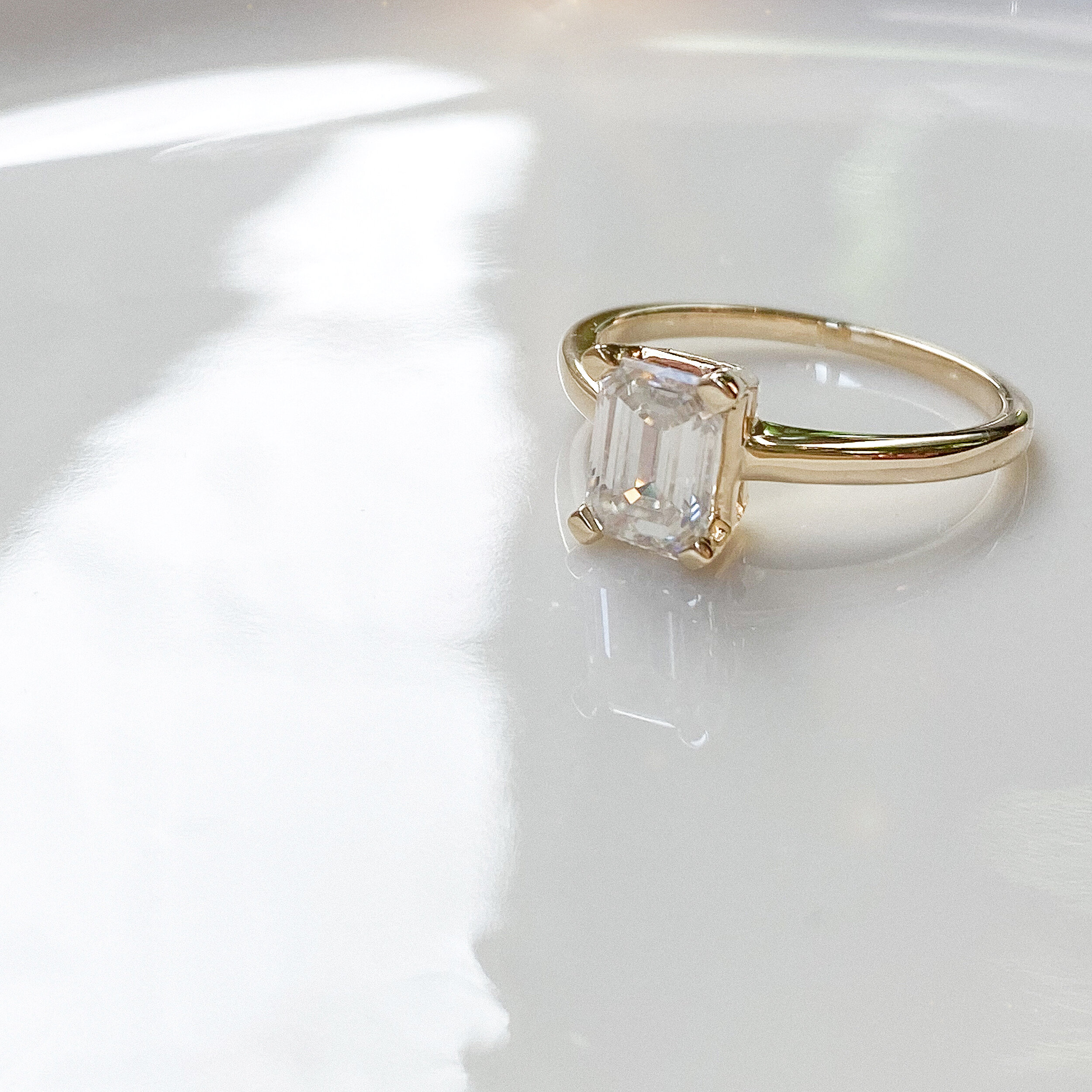 14k yellow gold ring with moissanite