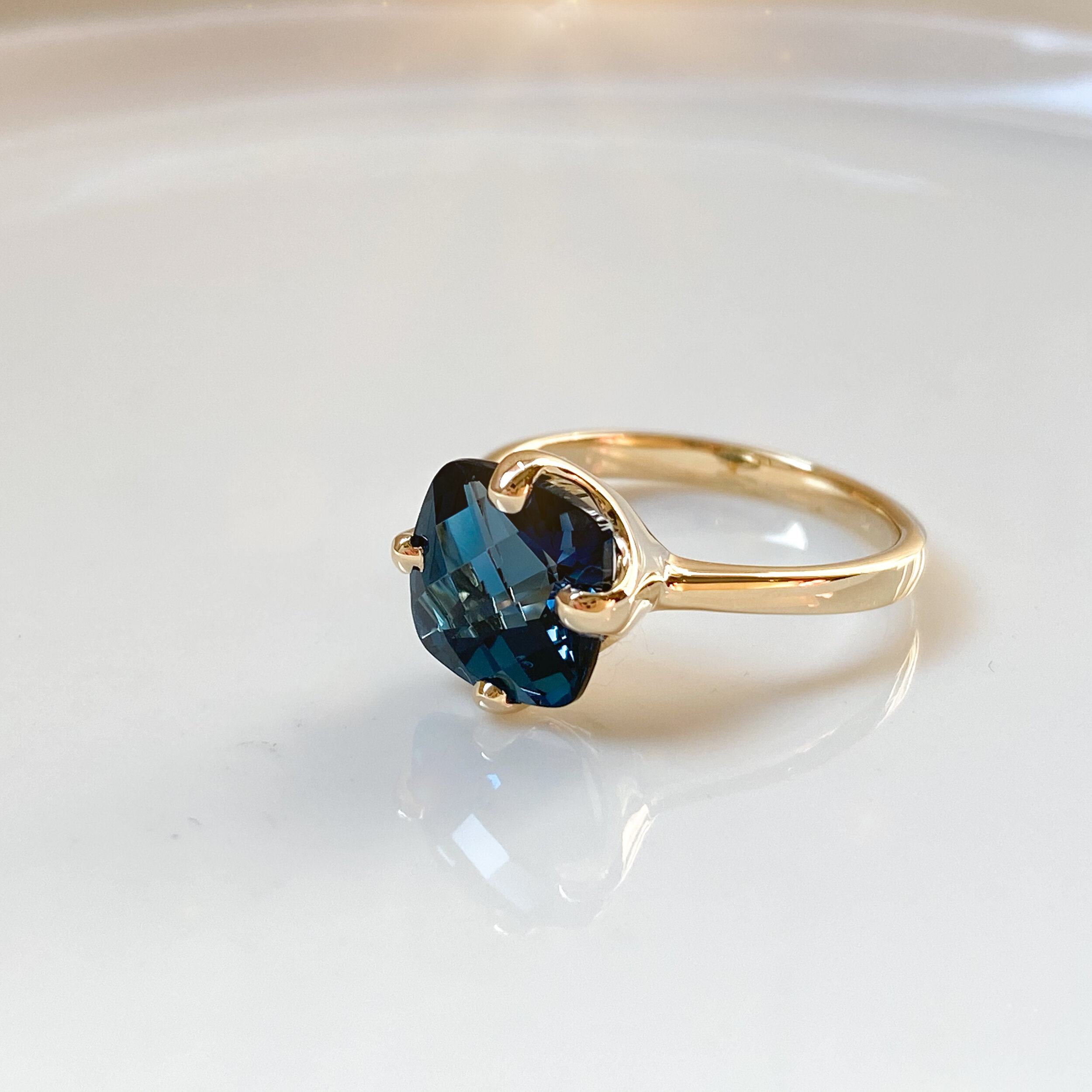 14k yellow gold ring with london blue topaz