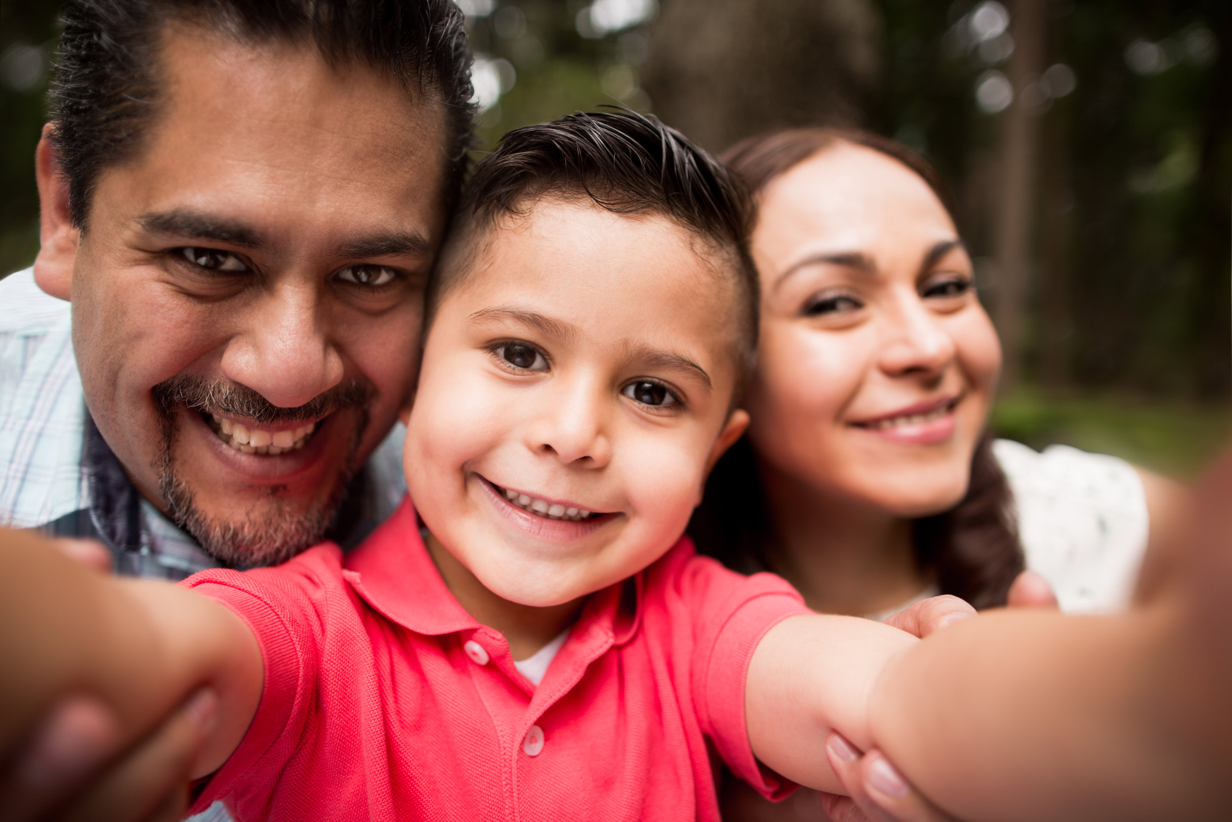 Latin-family-taking-a-selfie-and-smiling-at-camera-616887630_5760x3840.jpeg