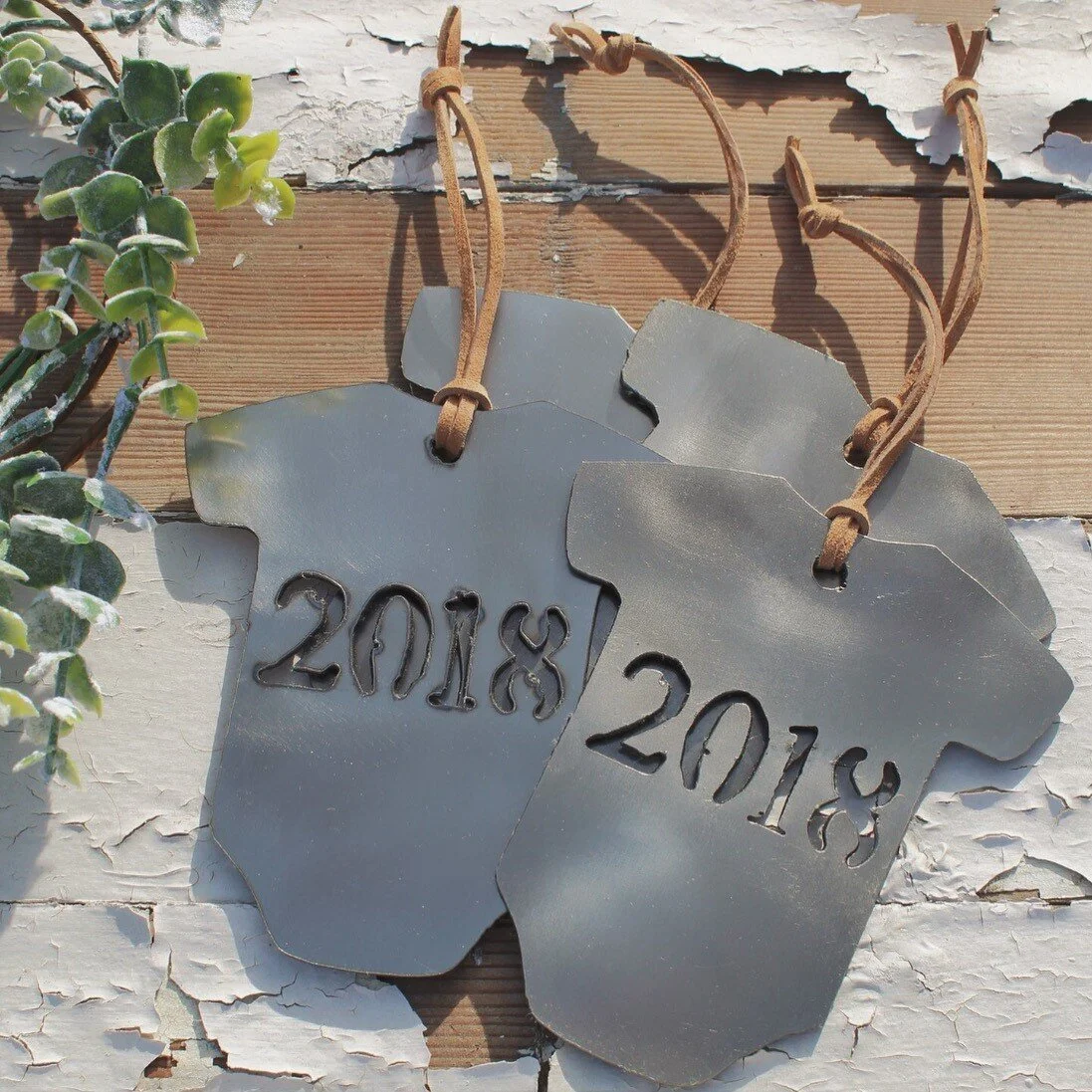 One of our favorites are the onesie ornaments . Gift them to your family to surprise them with a pregnancy announcement, or get one to commemorate baby’s first Christmas.