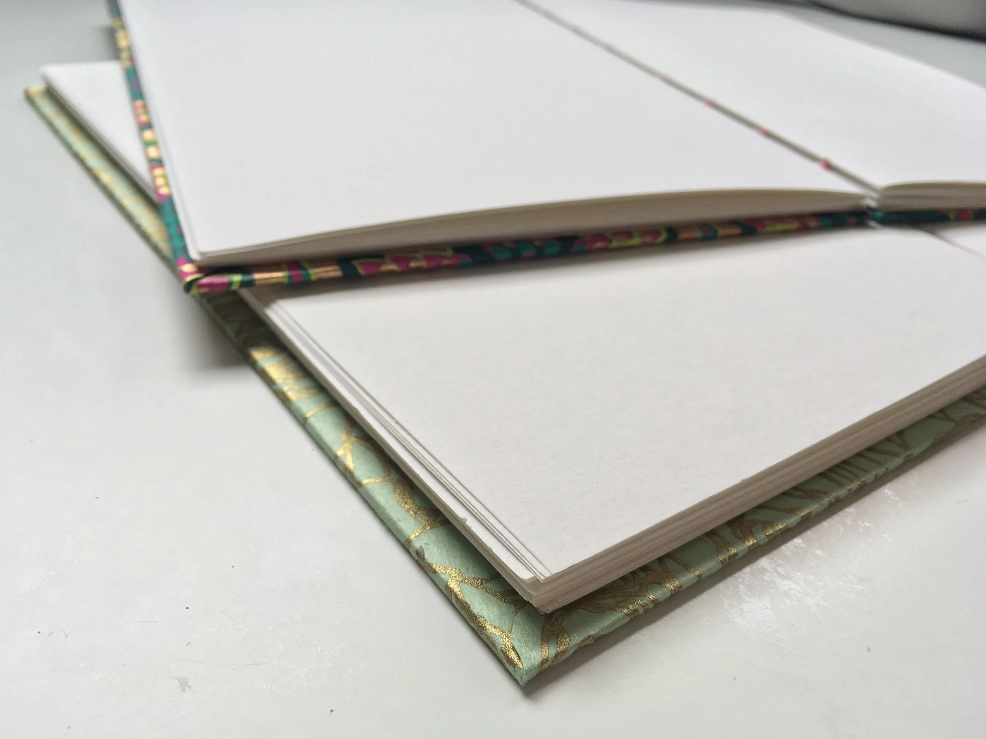 Hand-bound journals. 