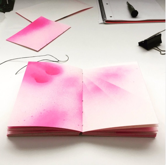 Hand-bound art journal with hand-sprayed pages. 