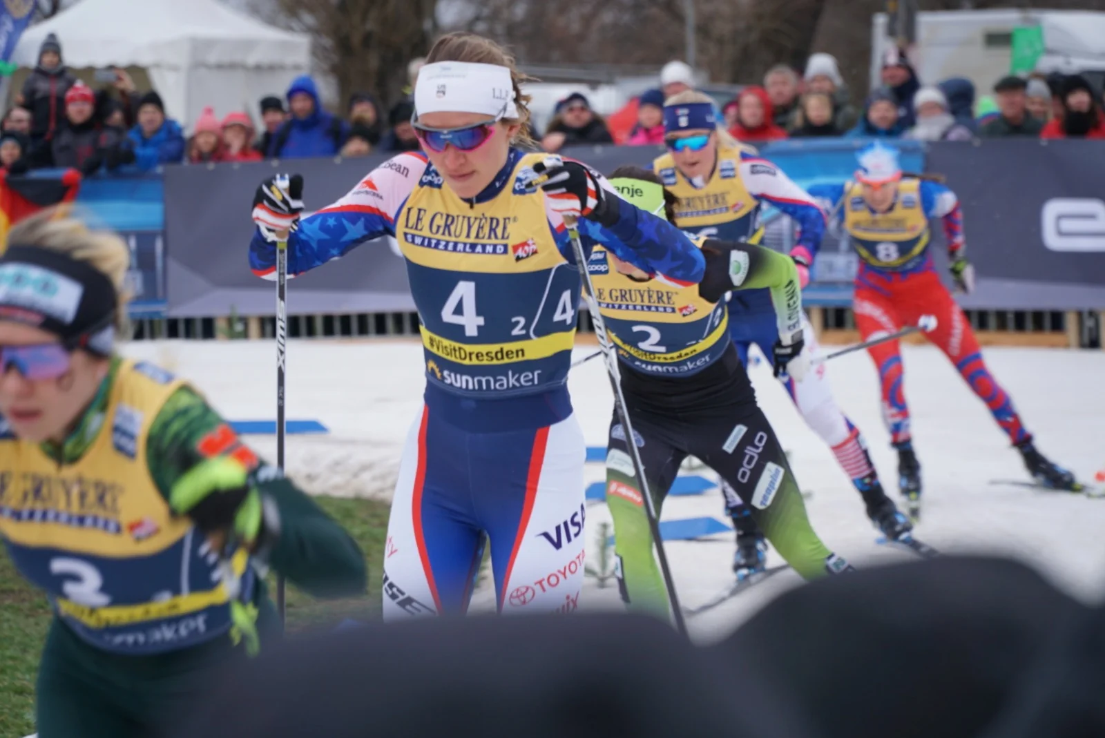 Hannah (background) following teammate, Sophie Caldwell (foreground) in the team sprint in Dresden, Germany. Photo Credit Garrott Kuzzy lumiexperiences.com