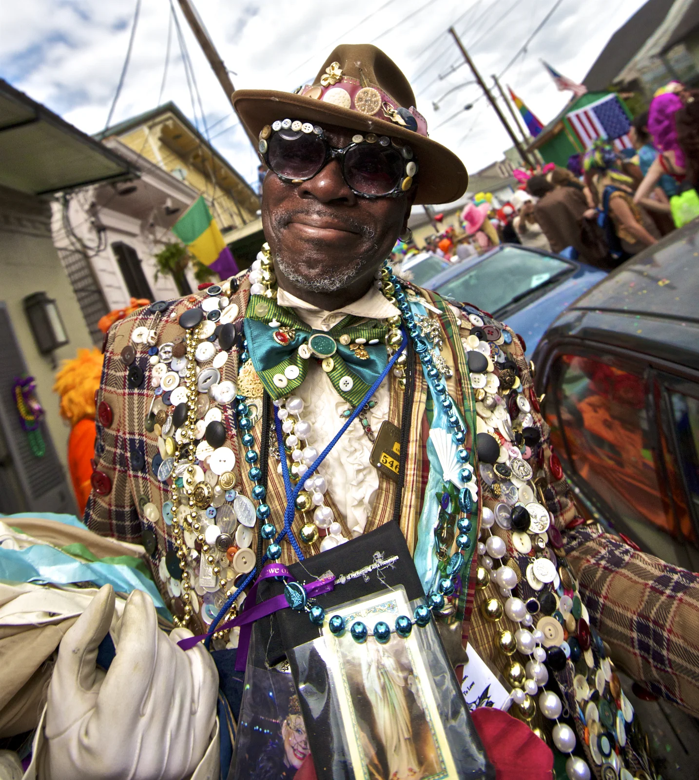 Button Man on Mardi Gras Day in New Orleans. A Mardi Gras Indian in New Orleans. Image by New Orleans based travel photographer, Marc Pagani - marcpagani.com